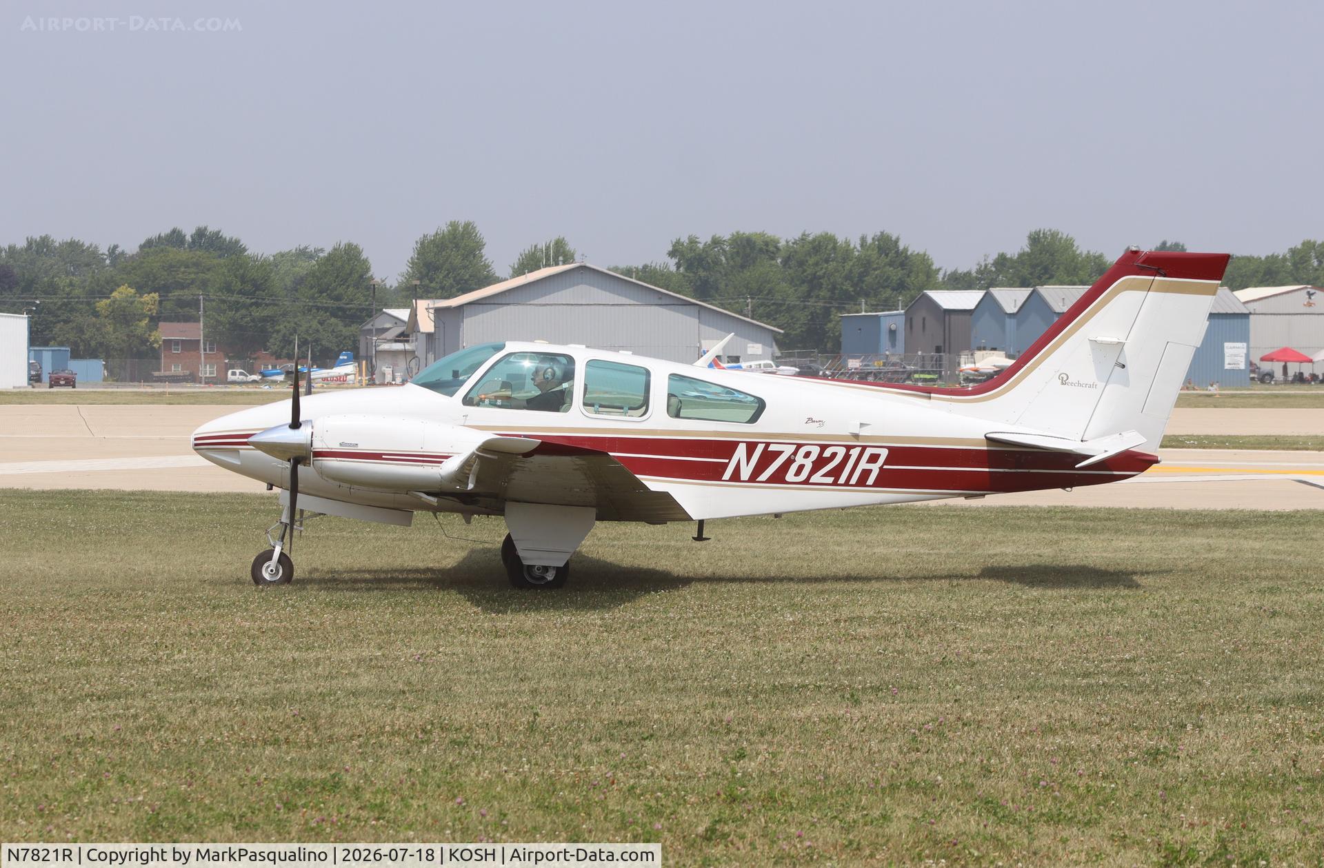 Aircraft N7821R, 1968 Beech 95-B55 (T42A) Baron, c/n TC-1196, Beech B55, at KOSH, photo by MarkPasqualino