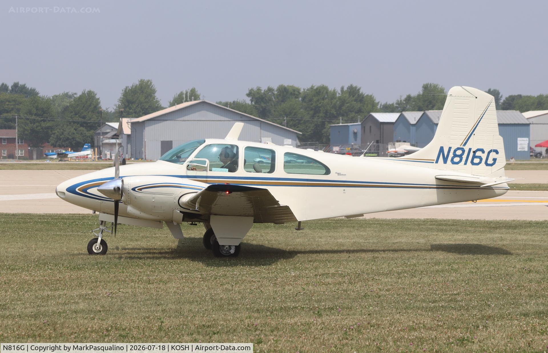 Aircraft N816G, 1964 Beech D95A, c/n TD-562, Beech D95A, at KOSH, photo by MarkPasqualino