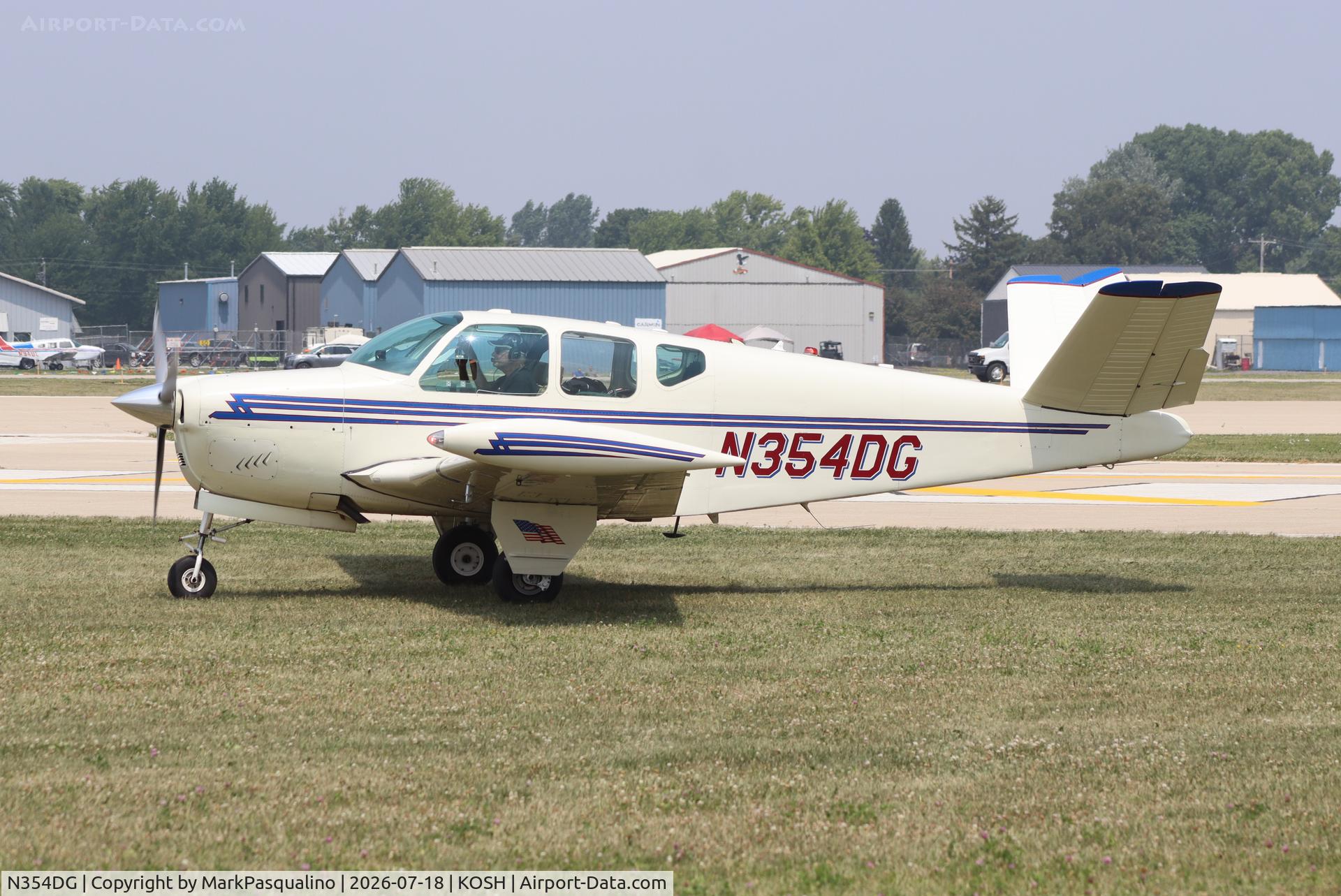 Aircraft N354DG, 1958 Beech J35 Bonanza, c/n D-5573, Beech J35, at KOSH, photo by MarkPasqualino