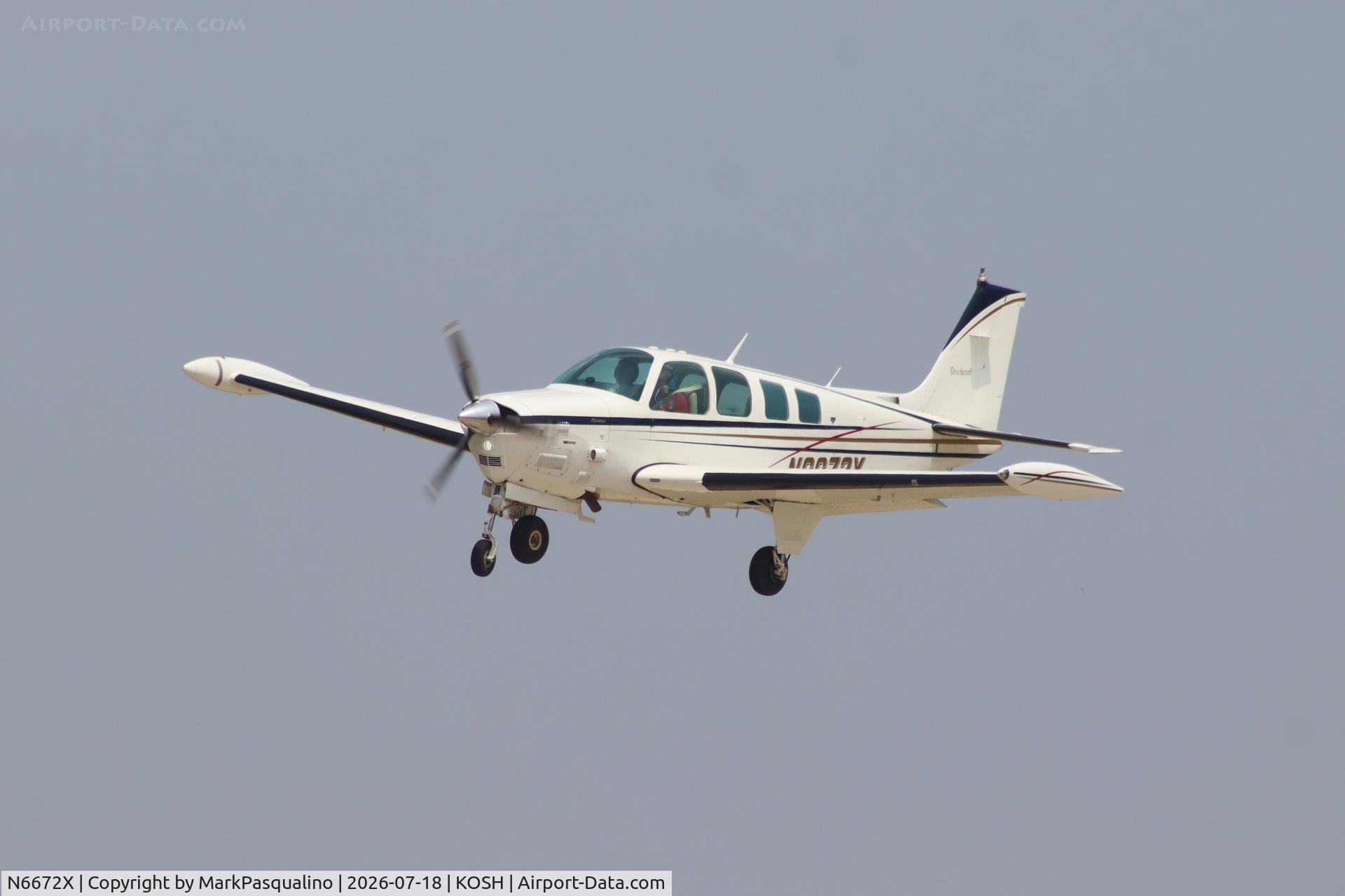 Aircraft N6672X, 1979 Beech A36TC Bonanza 36, c/n EA-32, Beech A36TC, at KOSH, photo by MarkPasqualino