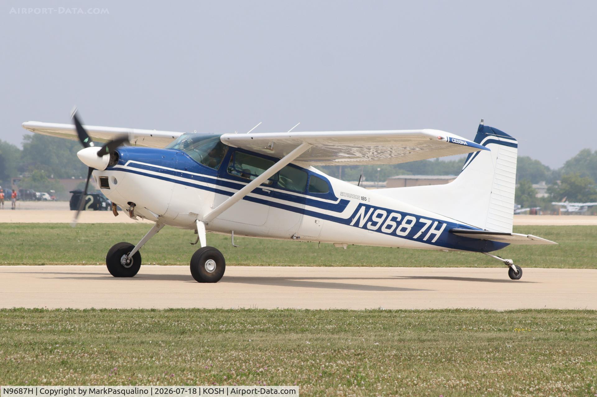 Aircraft N9687H, 1977 Cessna A185F Skywagon 185, c/n 18503461, Cessna A185F, at KOSH, photo by MarkPasqualino