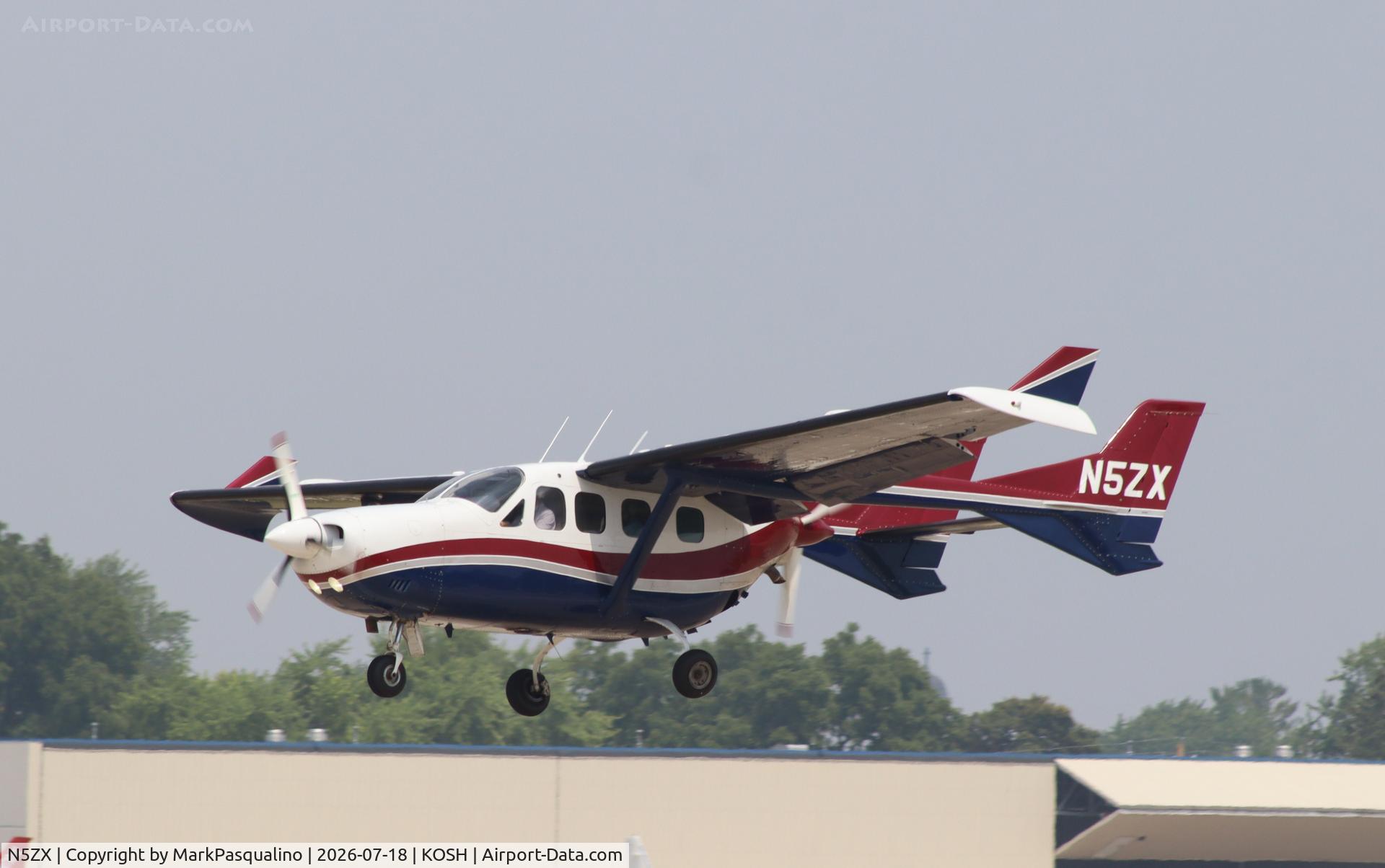 Aircraft N5ZX, 1977 Cessna T337G Turbo Super Skymaster, c/n P3370273, Cessna T337G, at KOSH, photo by MarkPasqualino