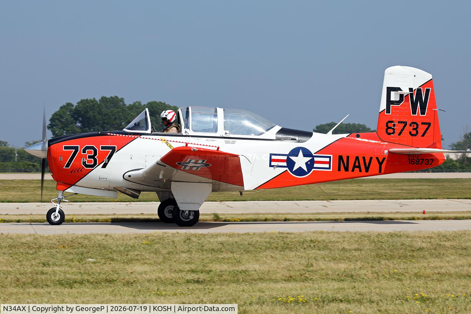 Aircraft N34AX, 1956 Beech T34 Mentor, c/n CG-141, Airventure 2026., at KOSH, photo by GeorgeP
