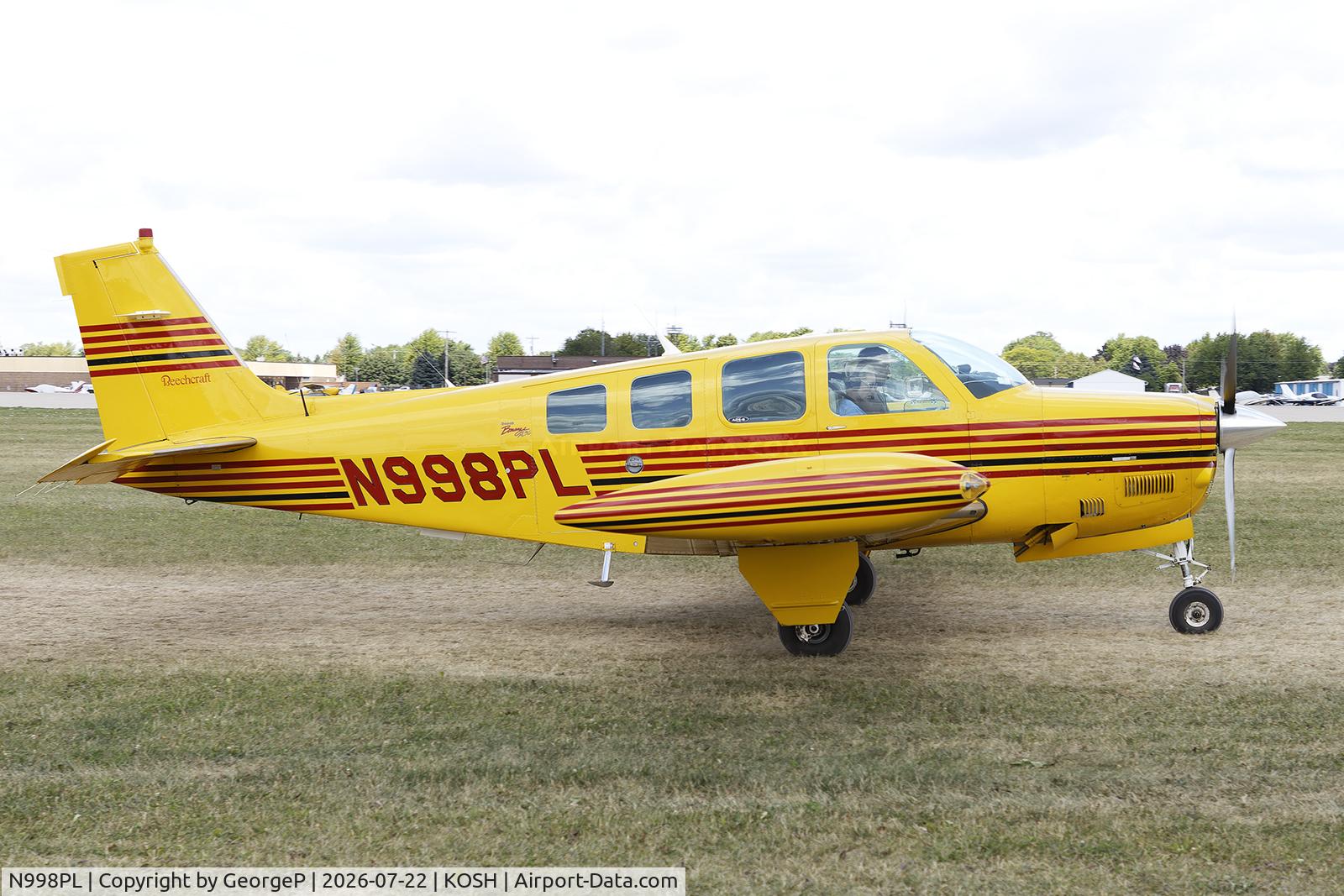 Aircraft N998PL, 1996 Raytheon Aircraft Company A36 Bonanza, c/n E-3036, Airventure 2026., at KOSH, photo by GeorgeP