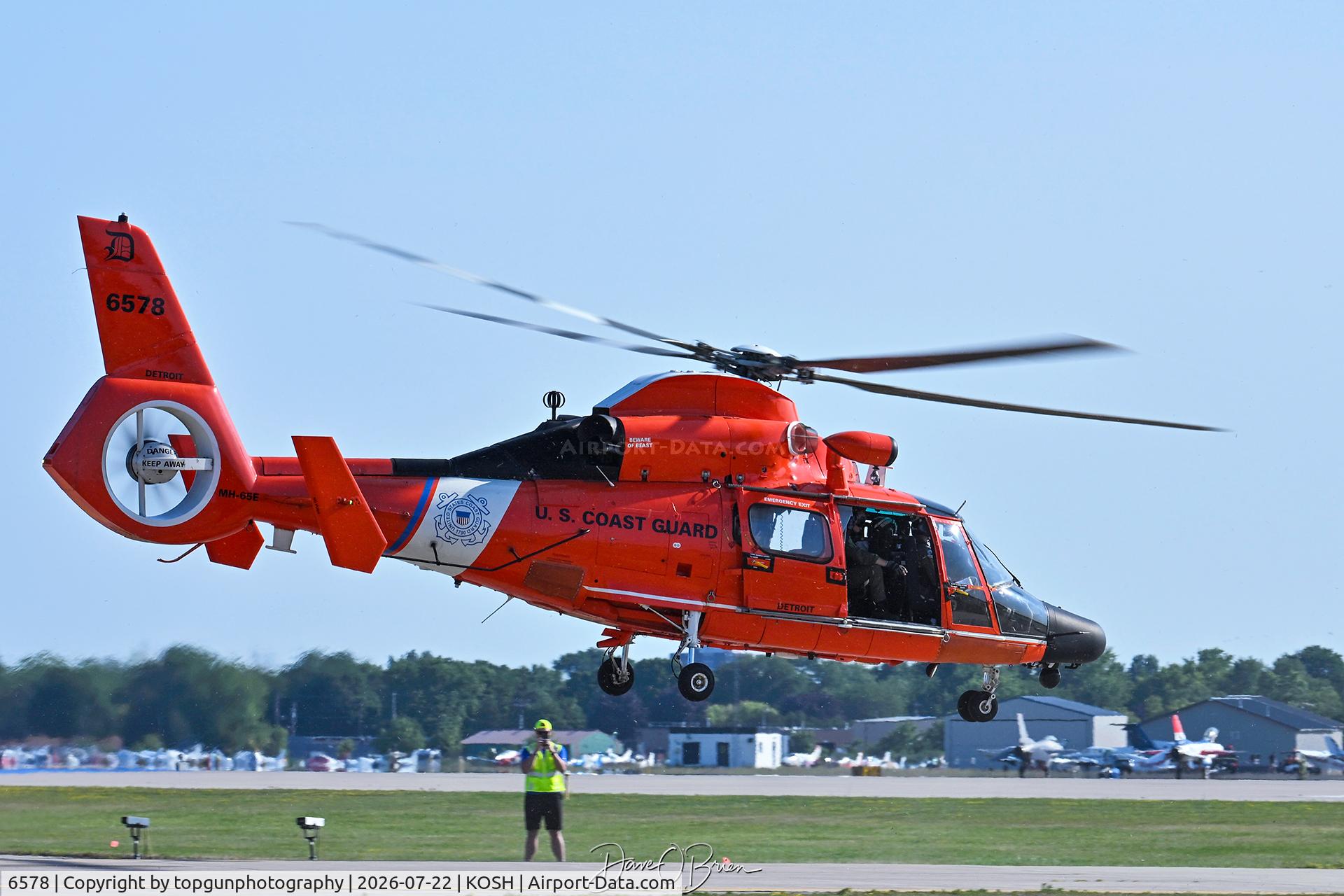 Aircraft 6578, Aerospatiale HH-65C Dolphin, c/n 6275, USCG Helo heads back to Detroit Air Station, at KOSH, photo by topgunphotography