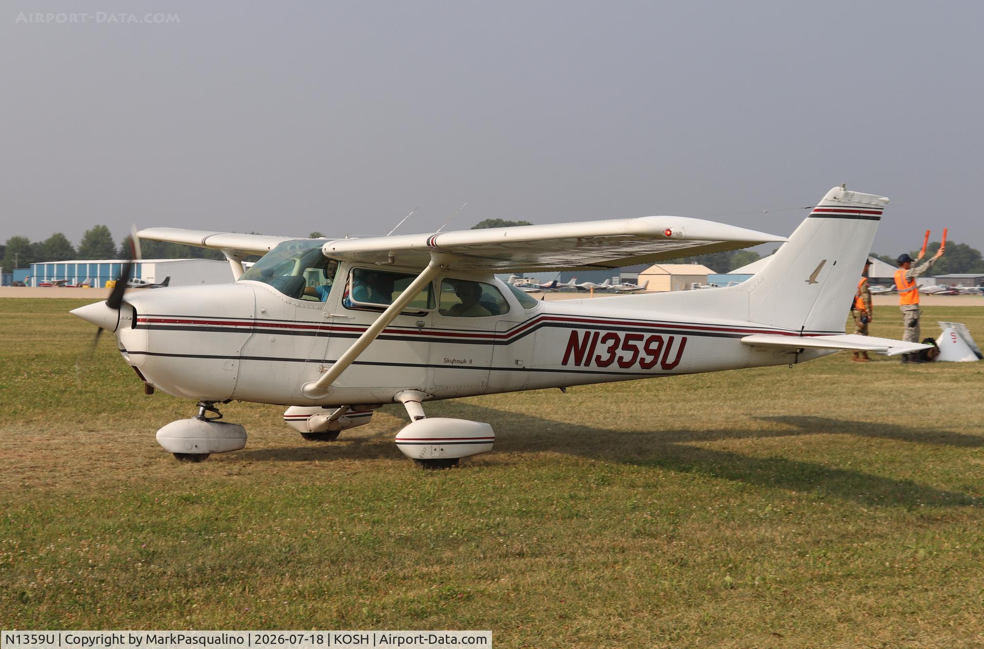 Aircraft N1359U, 1976 Cessna 172M, c/n 17267030, Cessna 172M, at KOSH, photo by MarkPasqualino