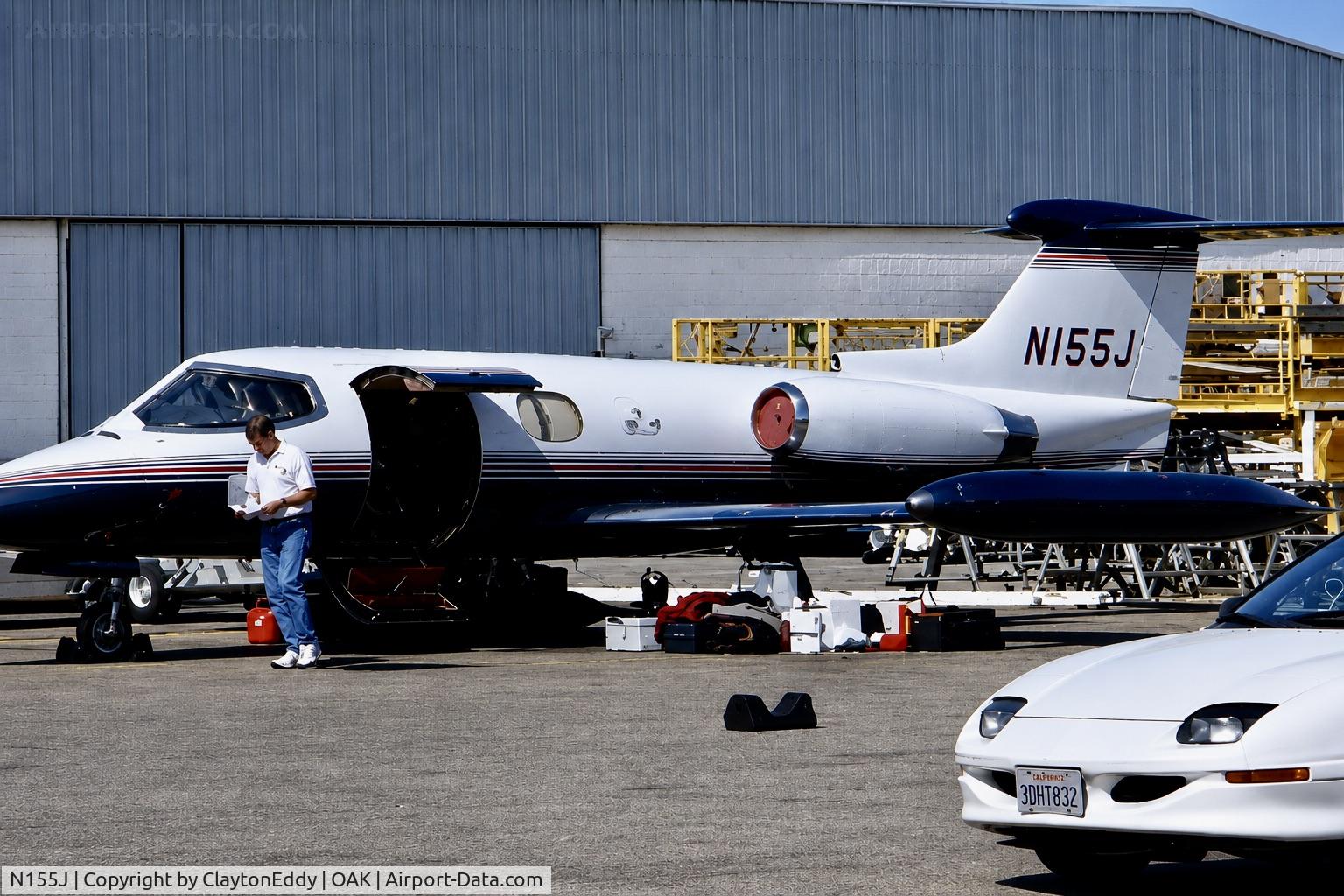 Aircraft N155J, 1969 Learjet 24B, c/n 182, United Airlines Oakland hangar 1990's, at OAK, photo by ClaytonEddy