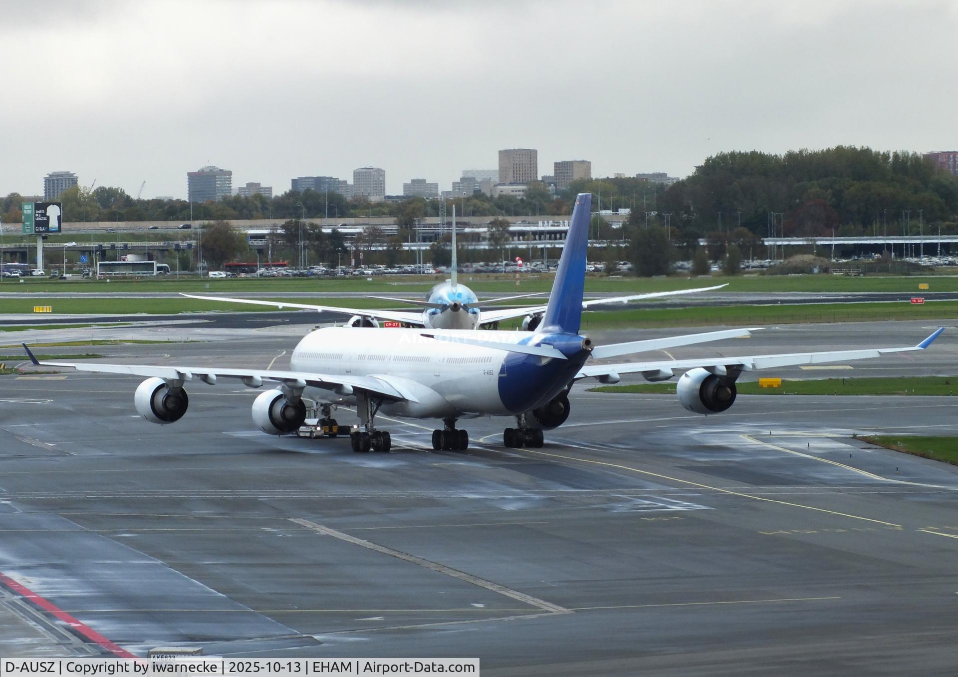 Aircraft D-AUSZ, 2004 Airbus A340-642, c/n 557, Airbus A340-642 of USC (Universal Sky Carrier) at Amsterdam Schiphol airport, at EHAM, photo by iwarnecke