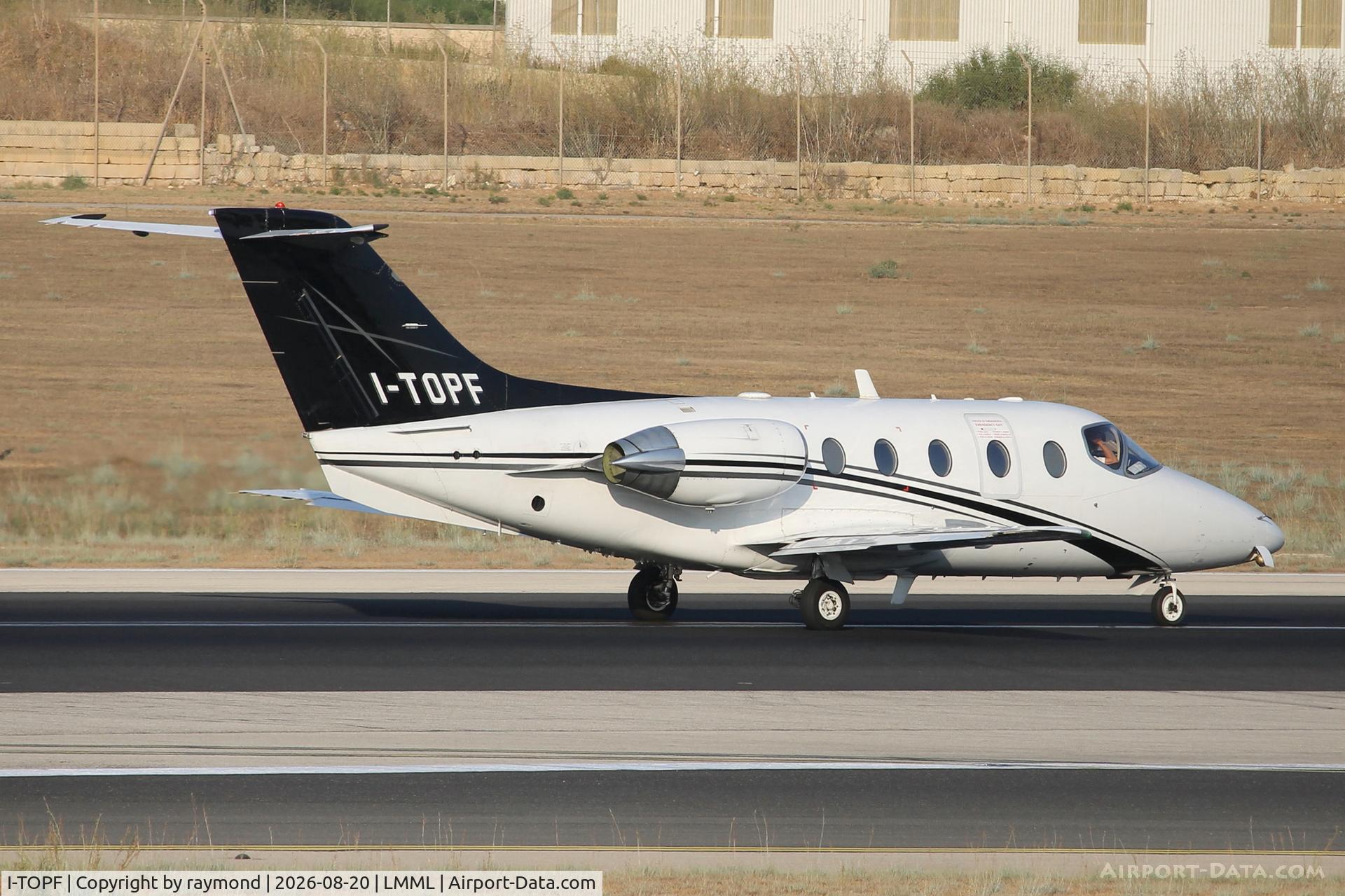 Aircraft I-TOPF, 1997 Raytheon Beechjet 400A, c/n RK-148, Raytheon Beechjet 400A reg I-TOPF of Aliserio rolling RW31 departing from Malta., at LMML, photo by raymond