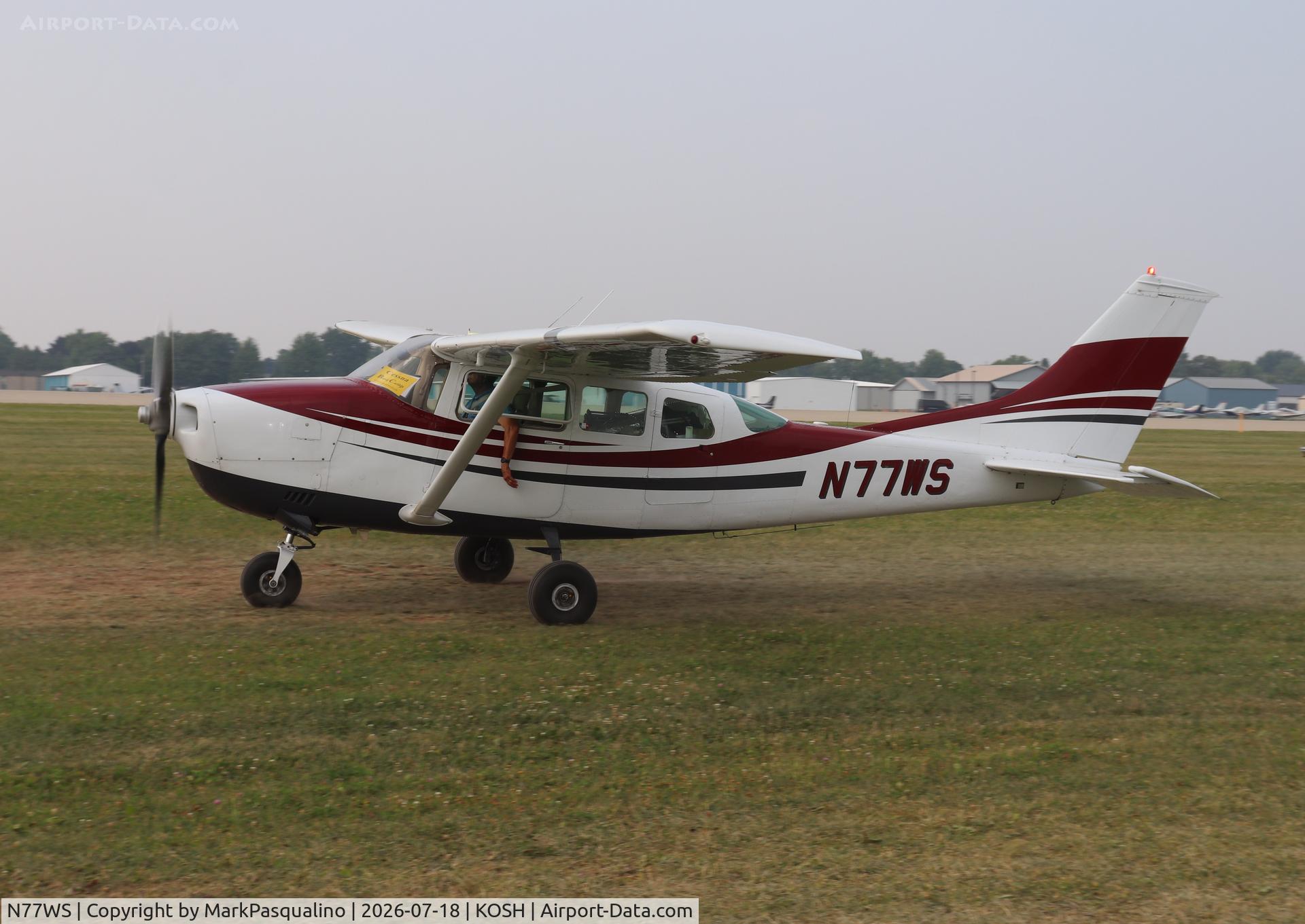 Aircraft N77WS, 1969 Cessna P206E Super Skylane, c/n P206-0628, Cessna P206E, at KOSH, photo by MarkPasqualino