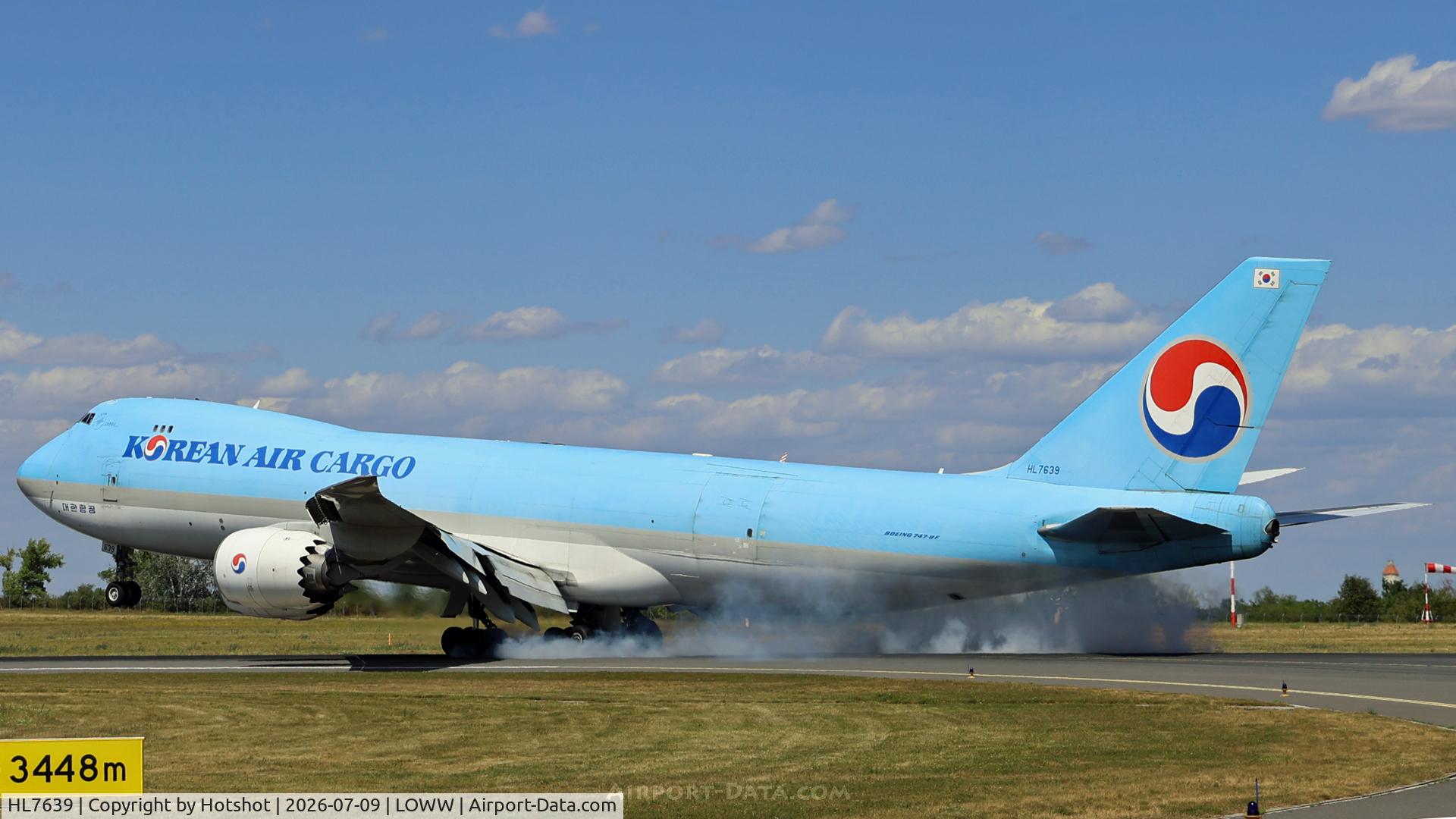 Aircraft HL7639, 2016 Boeing 747-8B5F, c/n 37653 l/n 1528, Smokey touchdown on runway 34., at LOWW, photo by Hotshot
