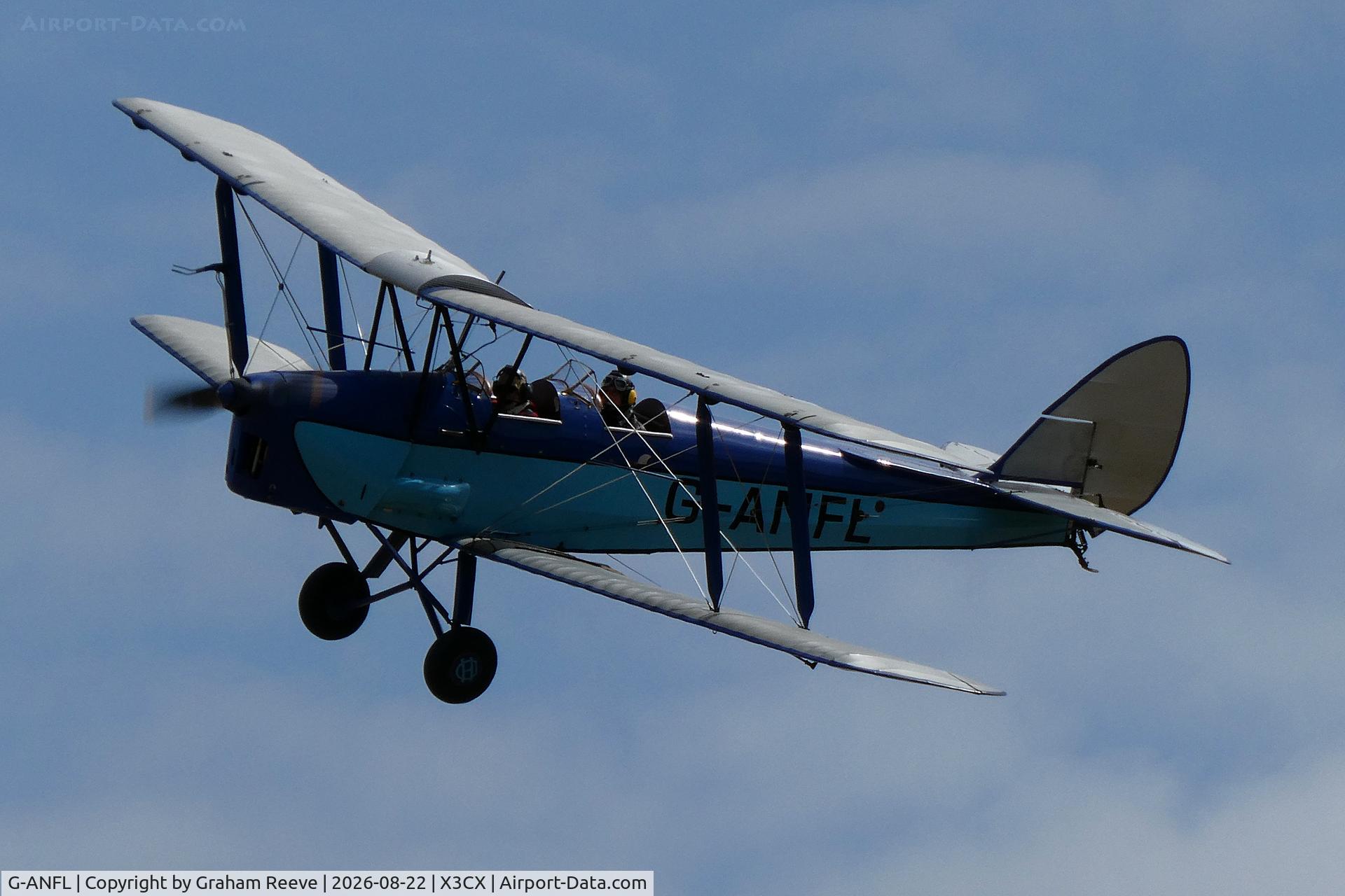 Aircraft G-ANFL, 1941 De Havilland DH-82A Tiger Moth II, c/n 84617, Overhead at Northrepps., at X3CX, photo by Graham Reeve