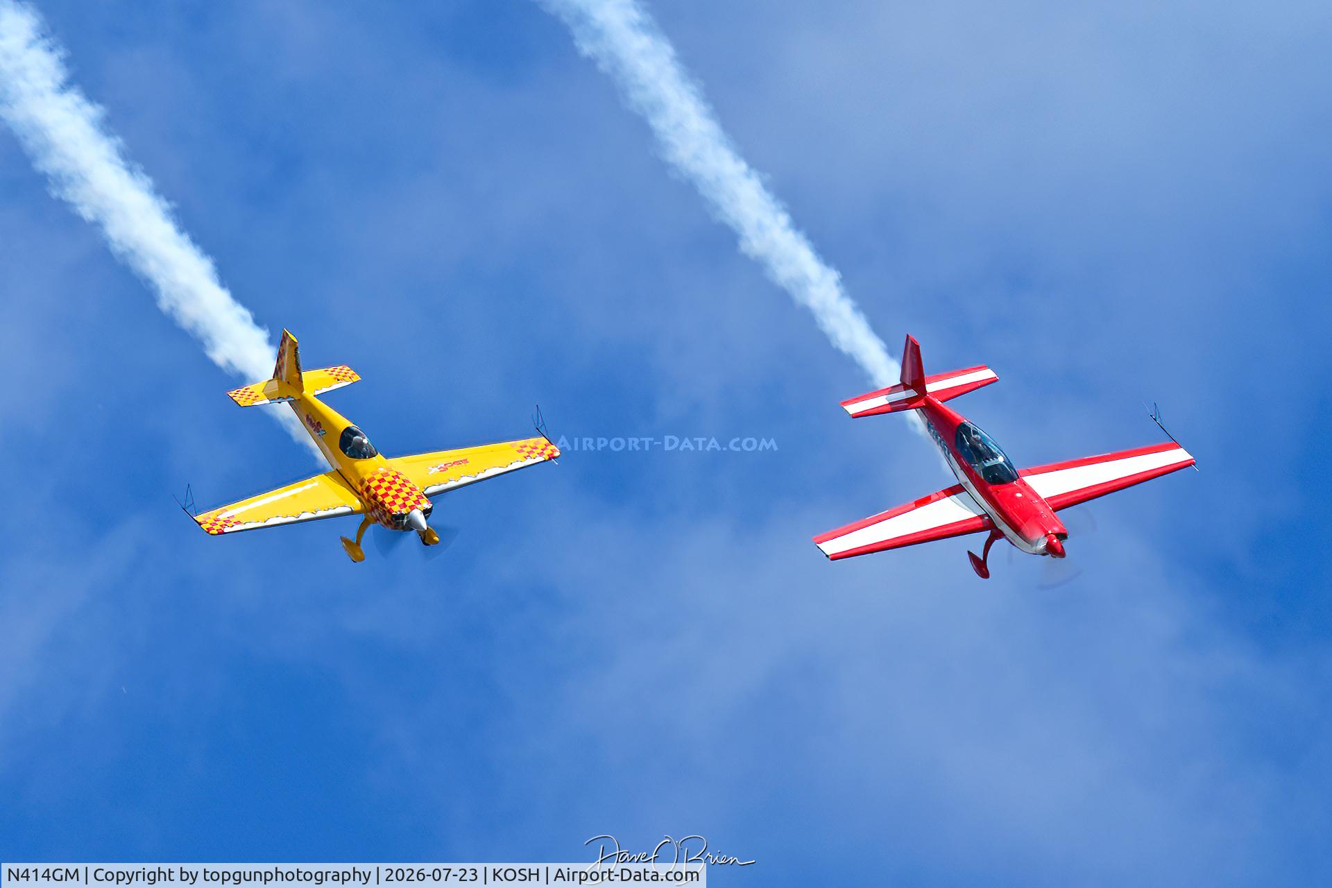 Aircraft N414GM, 2025 Extra Flugzeugproduktions Und EA 300/SX, c/n SX008, Bill Stein in the Yellow Extra and Matt Chapman in the Red/Wht, at KOSH, photo by topgunphotography