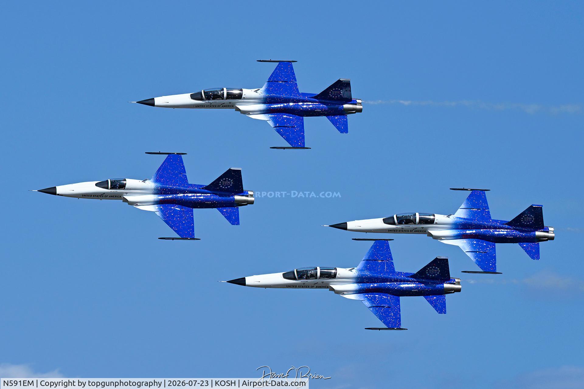 Aircraft N591EM, 1977 Northrop F-5E, c/n 77-1777, GHOST Flight in with the photo pass, at KOSH, photo by topgunphotography
