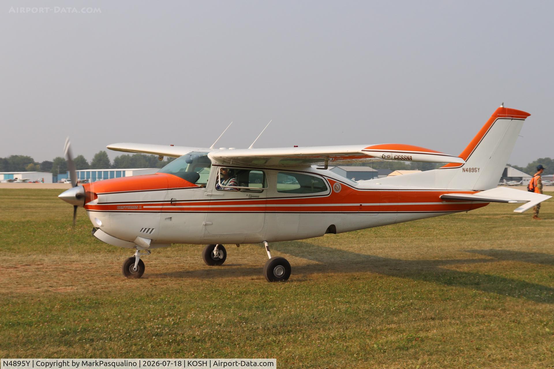 Aircraft N4895Y, 1980 Cessna T210N Turbo Centurion, c/n 21064033, Cessna T210N, at KOSH, photo by MarkPasqualino