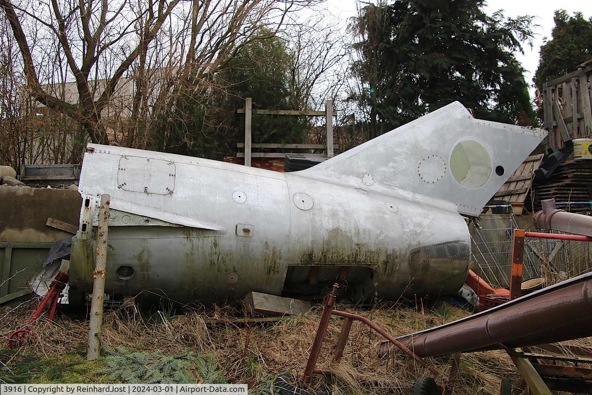 Aircraft 3916, Mikoyan-Gurevich MiG-15bisSB, c/n 623916, Tail of Czechoslovakian Air Force MiG-15 3916 in the backyard of a collector at Doubravice near Ceske Budejovice, Czech Republic, photo by ReinhardJost