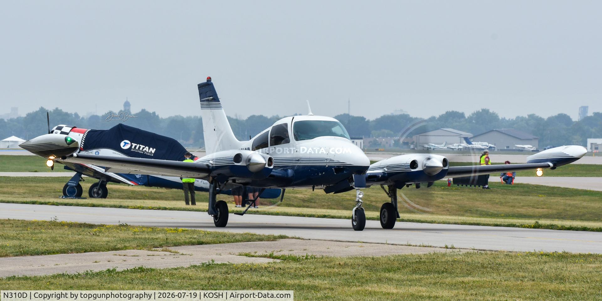 Aircraft N310D, 1969 Cessna T310Q, c/n 310Q0002, Oshkosh 26, at KOSH, photo by topgunphotography