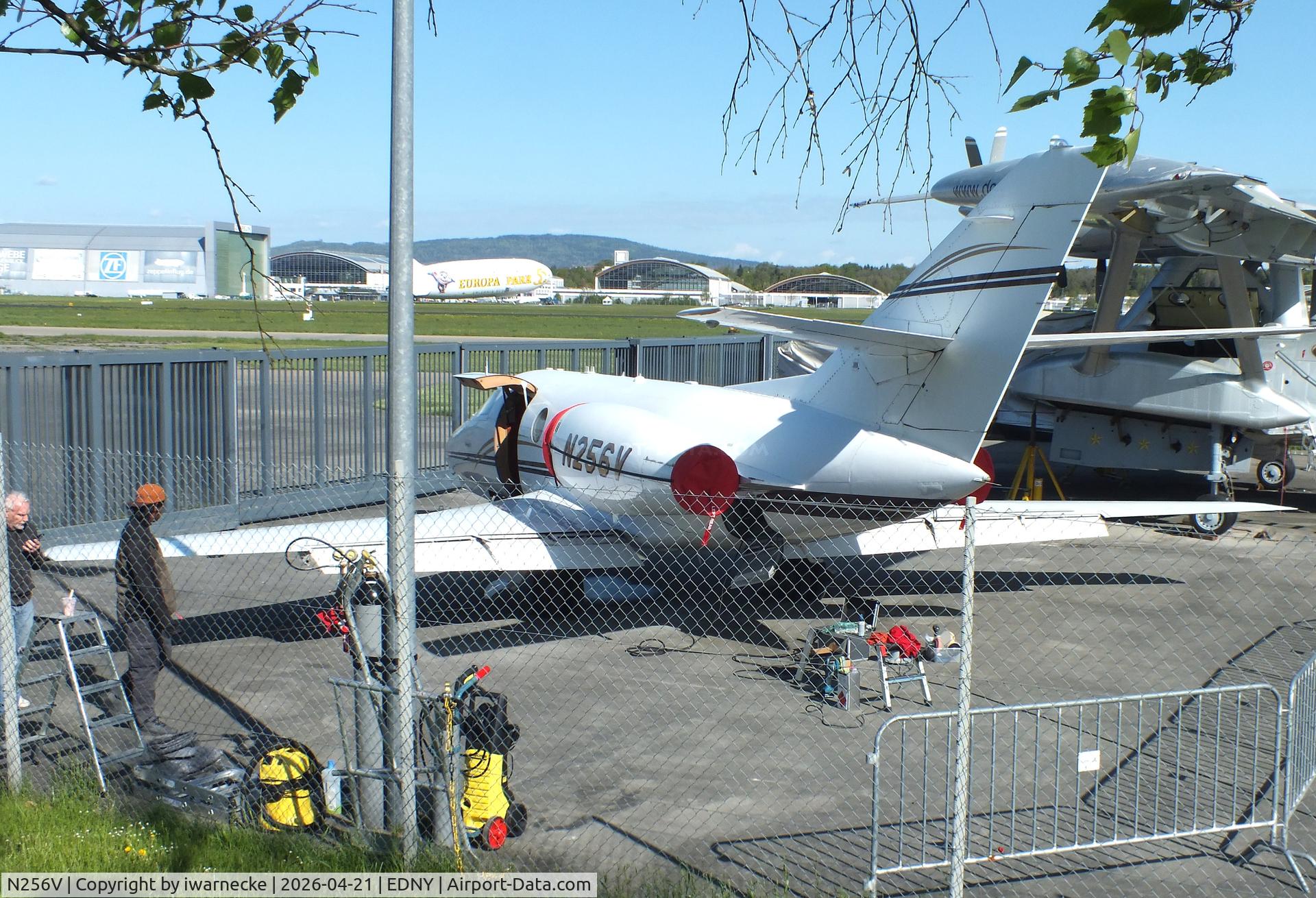 Aircraft N256V, 1979 Dassault Falcon 10, c/n 151, Dassault Falcon 10 undergoing maintenance outside the Dornier Museum at the Bodensee airport, Friedrichshafen, at EDNY, photo by iwarnecke