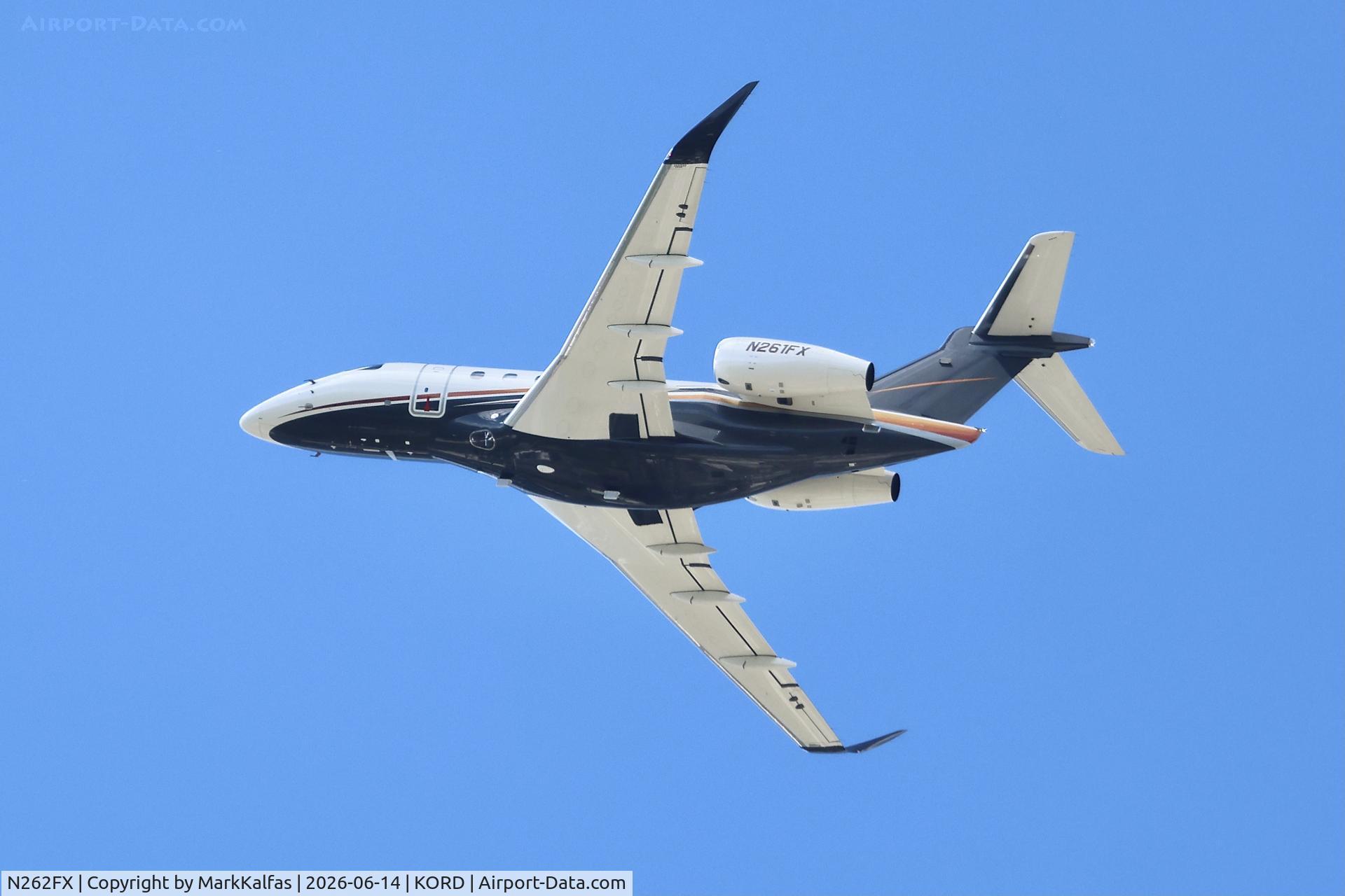 Aircraft N262FX, 2007 Learjet Inc 60, c/n 323, E545 FlexJet Embraer 545 Legacy N261FX departing 28R KORD, at KORD, photo by MarkKalfas