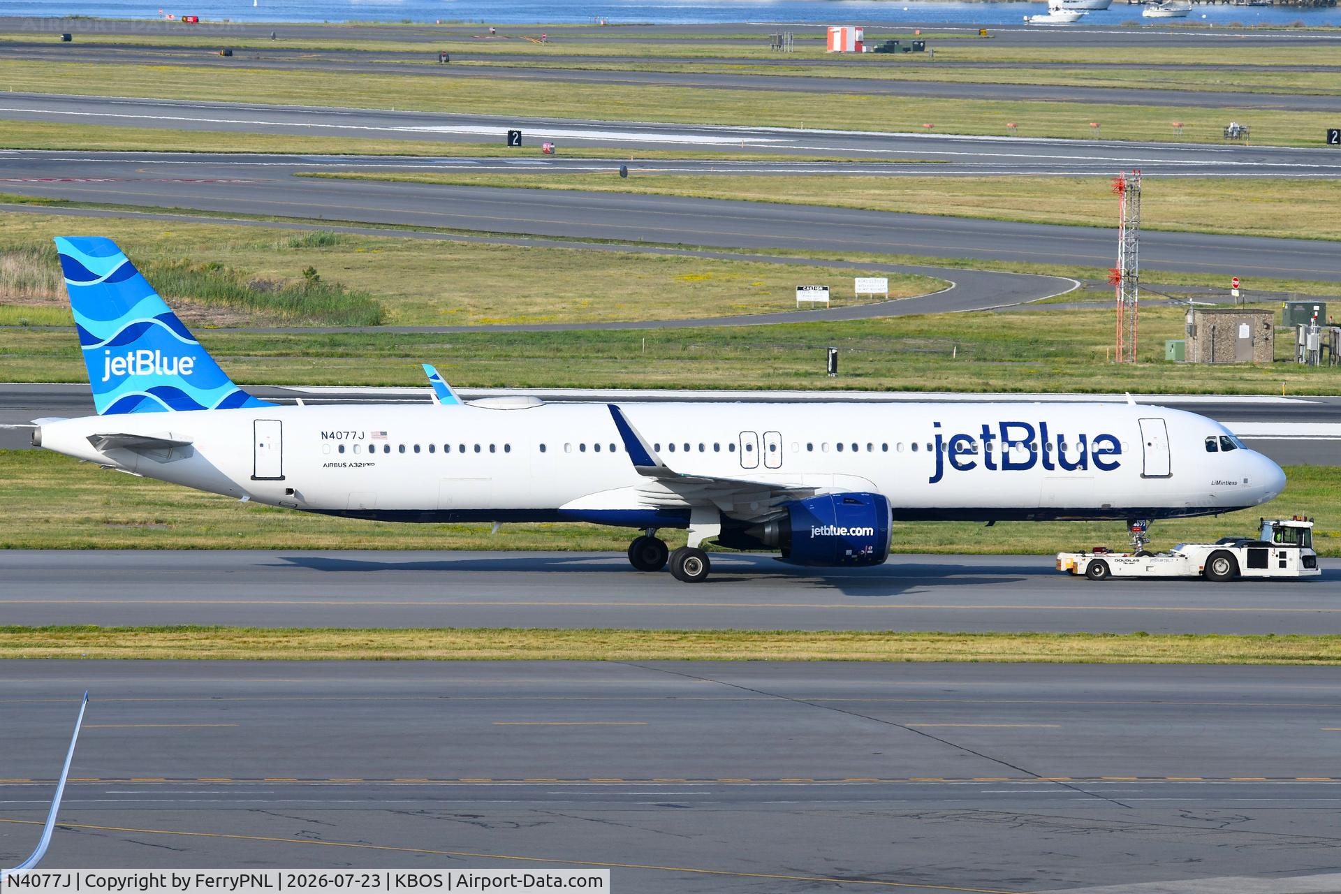 Aircraft N4077J, 2023 Airbus A321-271NX, c/n 11604, JetBlue A321N under tow from the hangar area to the gate, at KBOS, photo by FerryPNL