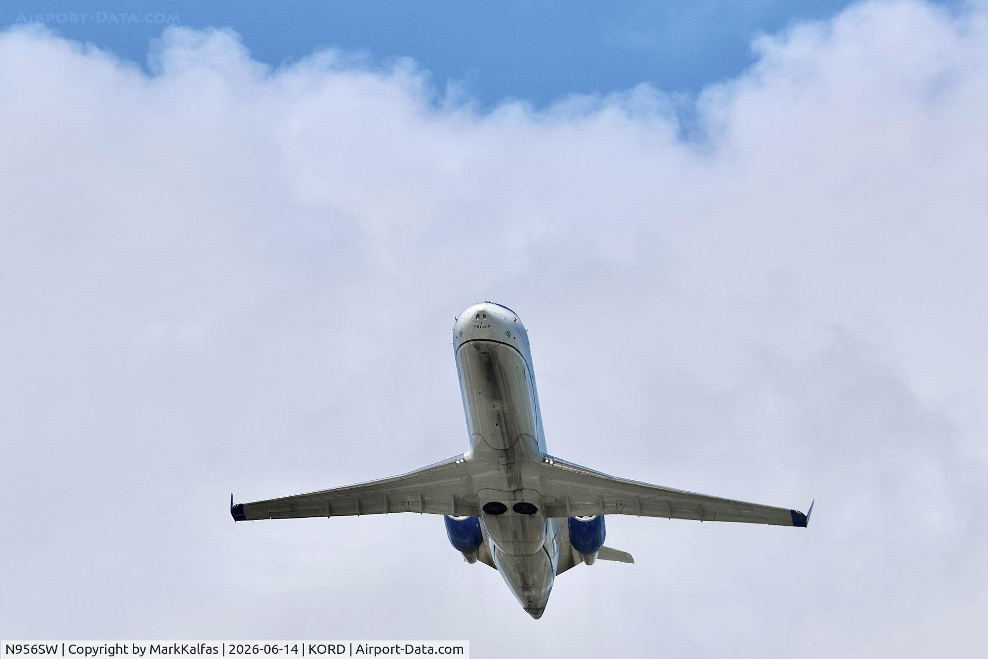 Aircraft N956SW, 2003 Canadair CL-600-2B19 Regional Jet CRJ-200LR, c/n 7825, CRJ2 SkyWest/United Express Bombardier CL-600-2B19 N956SW dearting 28R KORD, at KORD, photo by MarkKalfas