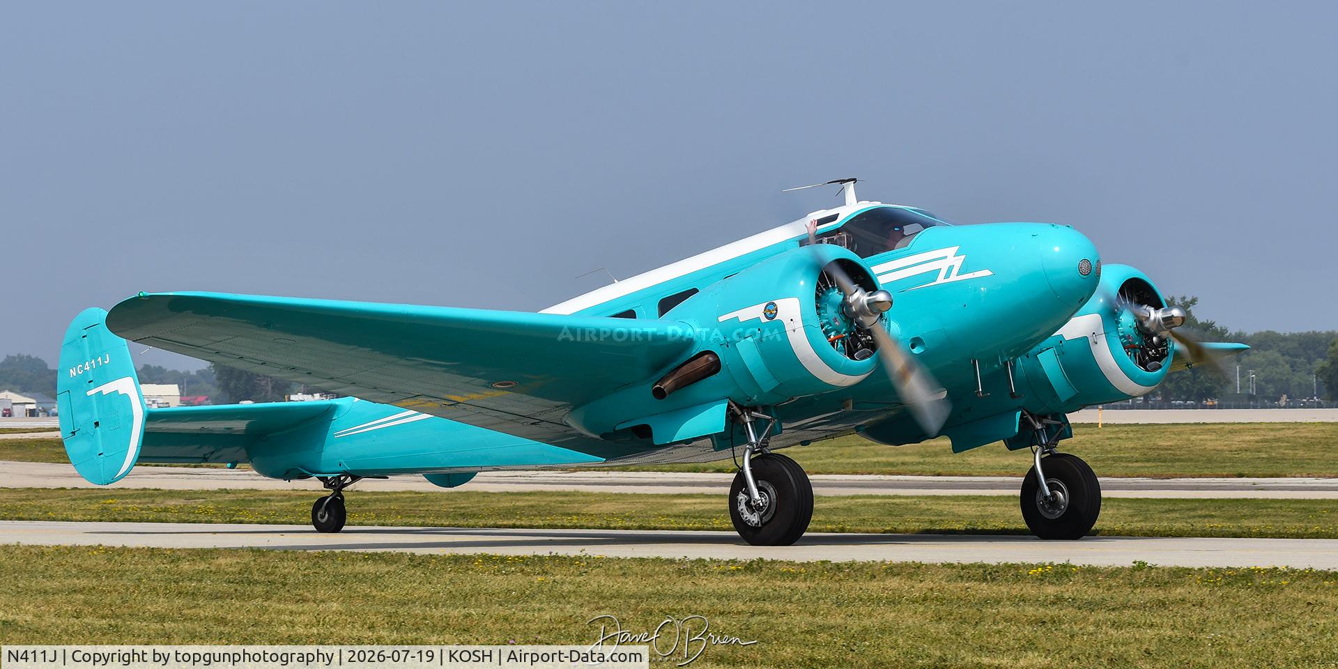 Aircraft N411J, 1953 Beech D18S, c/n A-967, Oshkosh 26, at KOSH, photo by topgunphotography
