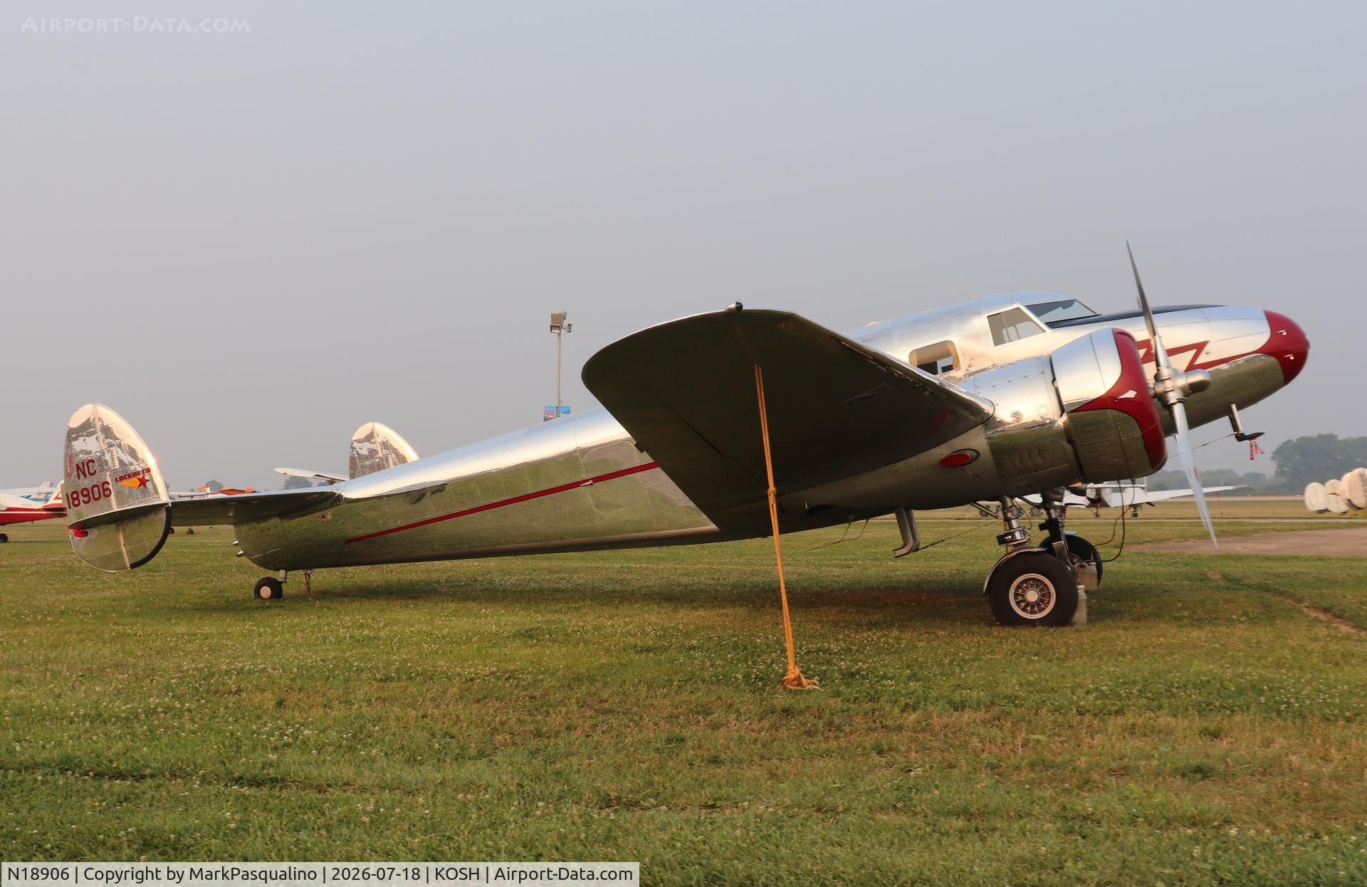 Aircraft N18906, Lockheed 12A Electra Junior, c/n 1277, Lockheed 12A Electra Junior, at KOSH, photo by MarkPasqualino
