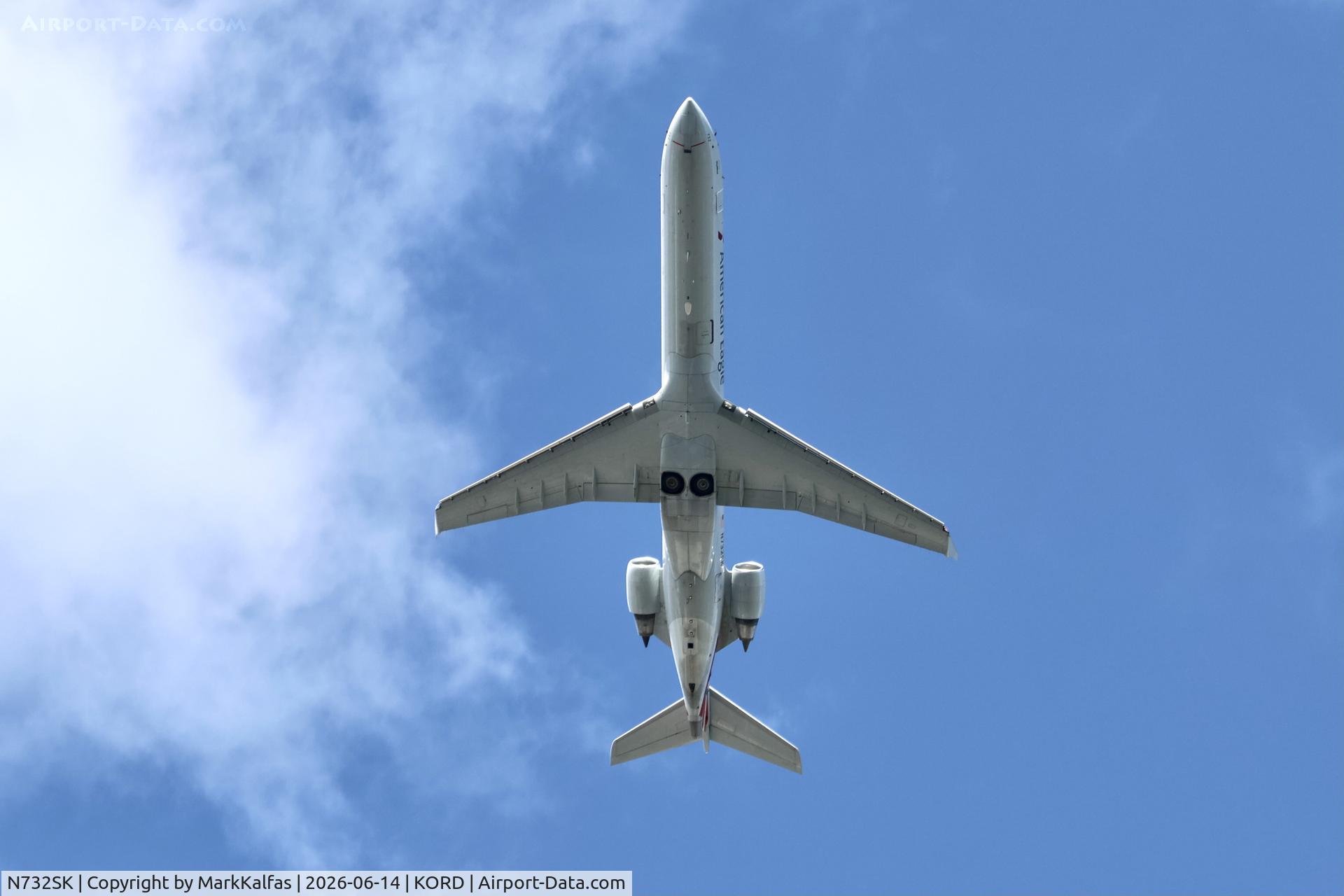 Aircraft N732SK, 2005 Bombardier CRJ-700 (CL-600-2C10) Regional Jet, c/n 10194, CRJ7 SkyWest/ American Eagle Bombardier CRJ-700 N732SK departing 28R KORD, at KORD, photo by MarkKalfas