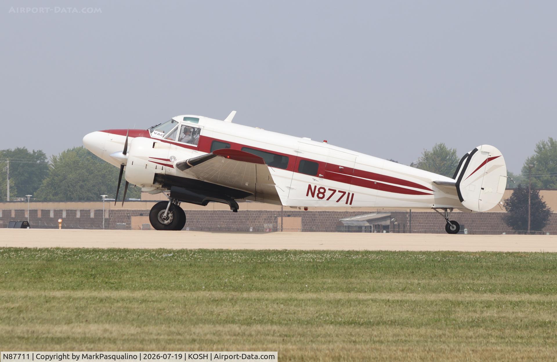 Aircraft N87711, 1963 Beech H-18, c/n BA-650, Beech H18, at KOSH, photo by MarkPasqualino