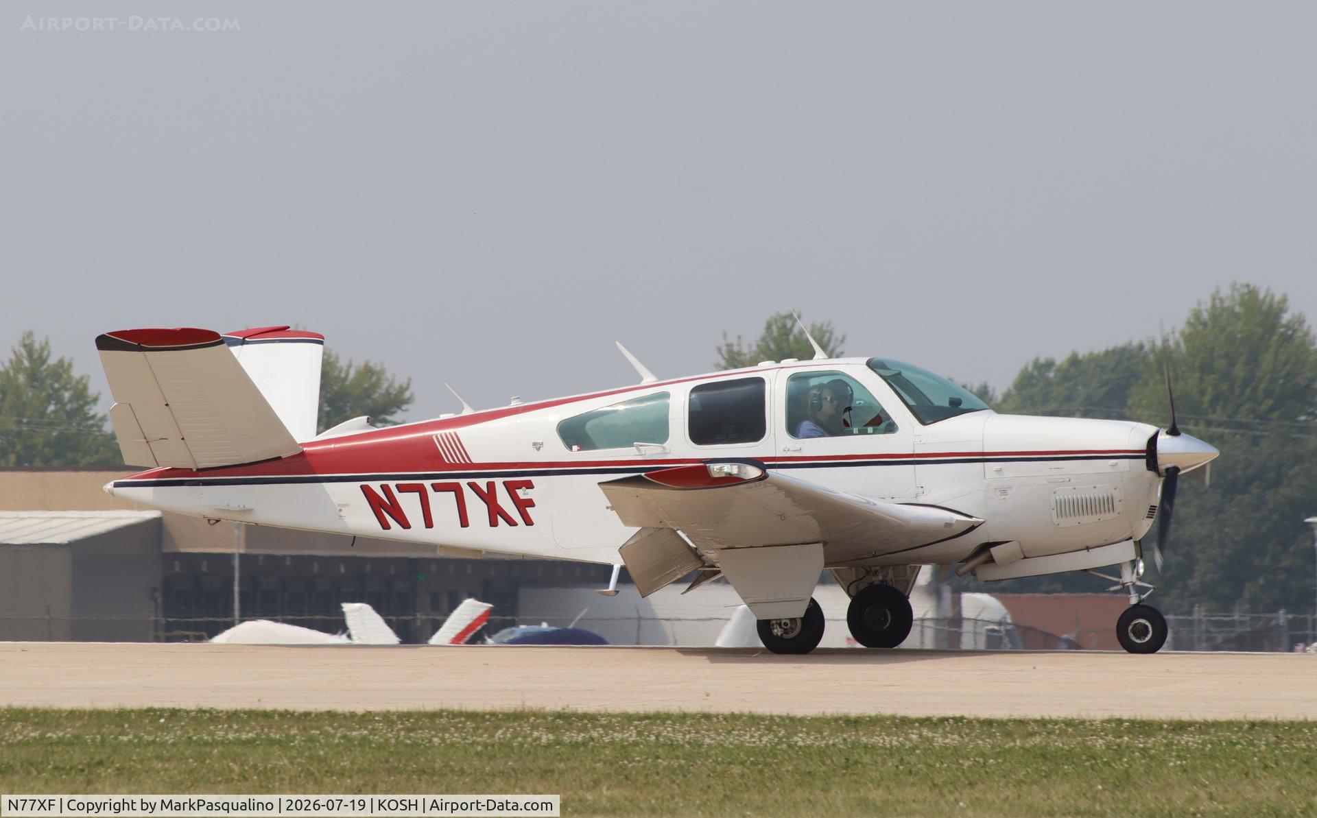 Aircraft N77XF, 1977 Beech V35B Bonanza, c/n D-9989, Beech V35B, at KOSH, photo by MarkPasqualino
