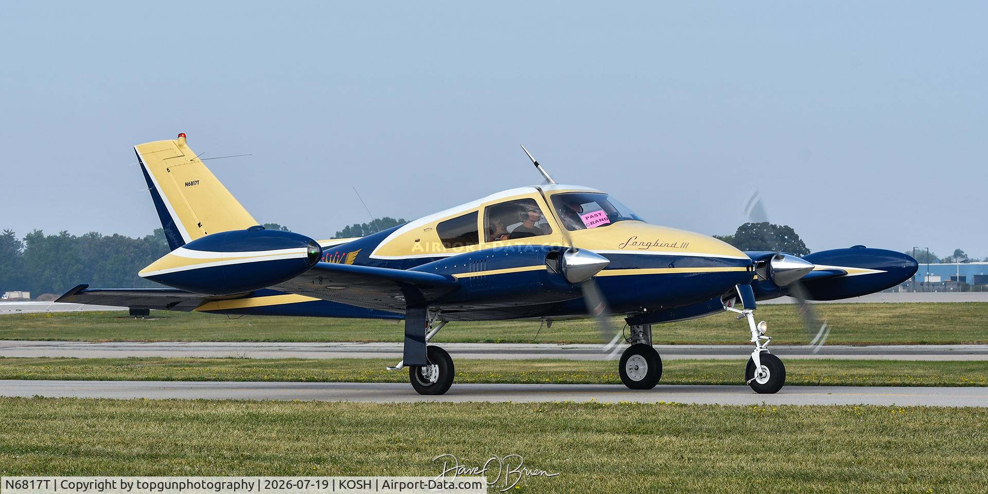 Aircraft N6817T, 1960 Cessna 310D, c/n 39117, Oshkosh 26, at KOSH, photo by topgunphotography