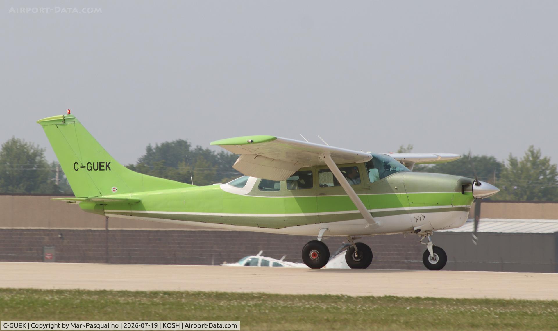 Aircraft C-GUEK, Cessna P206D Super Skylane, c/n P2060564, Cessna P206D, at KOSH, photo by MarkPasqualino
