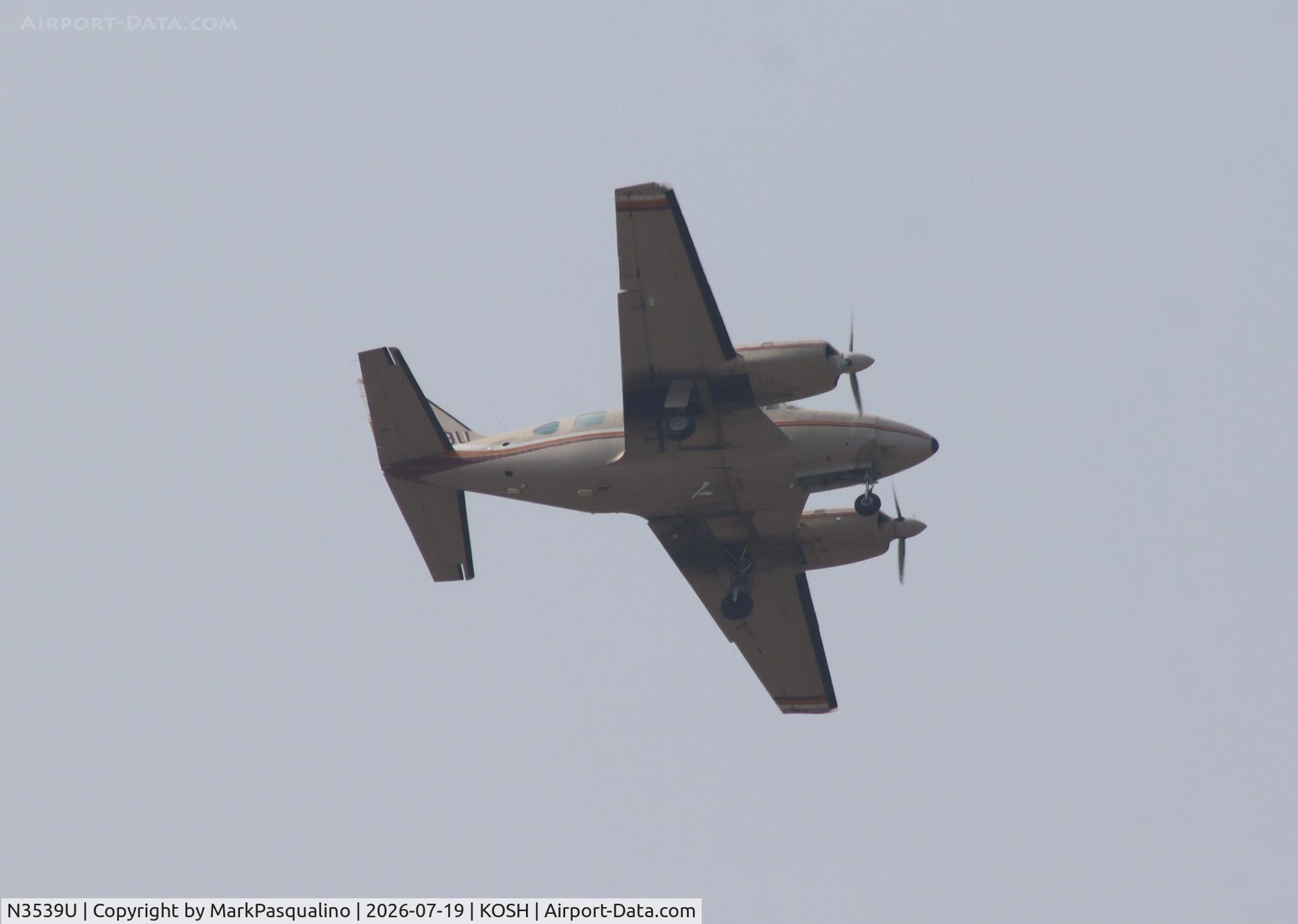 Aircraft N3539U, 1979 Piper PA-31-310 Navajo, c/n 31-7912120, Piper PA-31-310 Go around due to traffic on runway, at KOSH, photo by MarkPasqualino