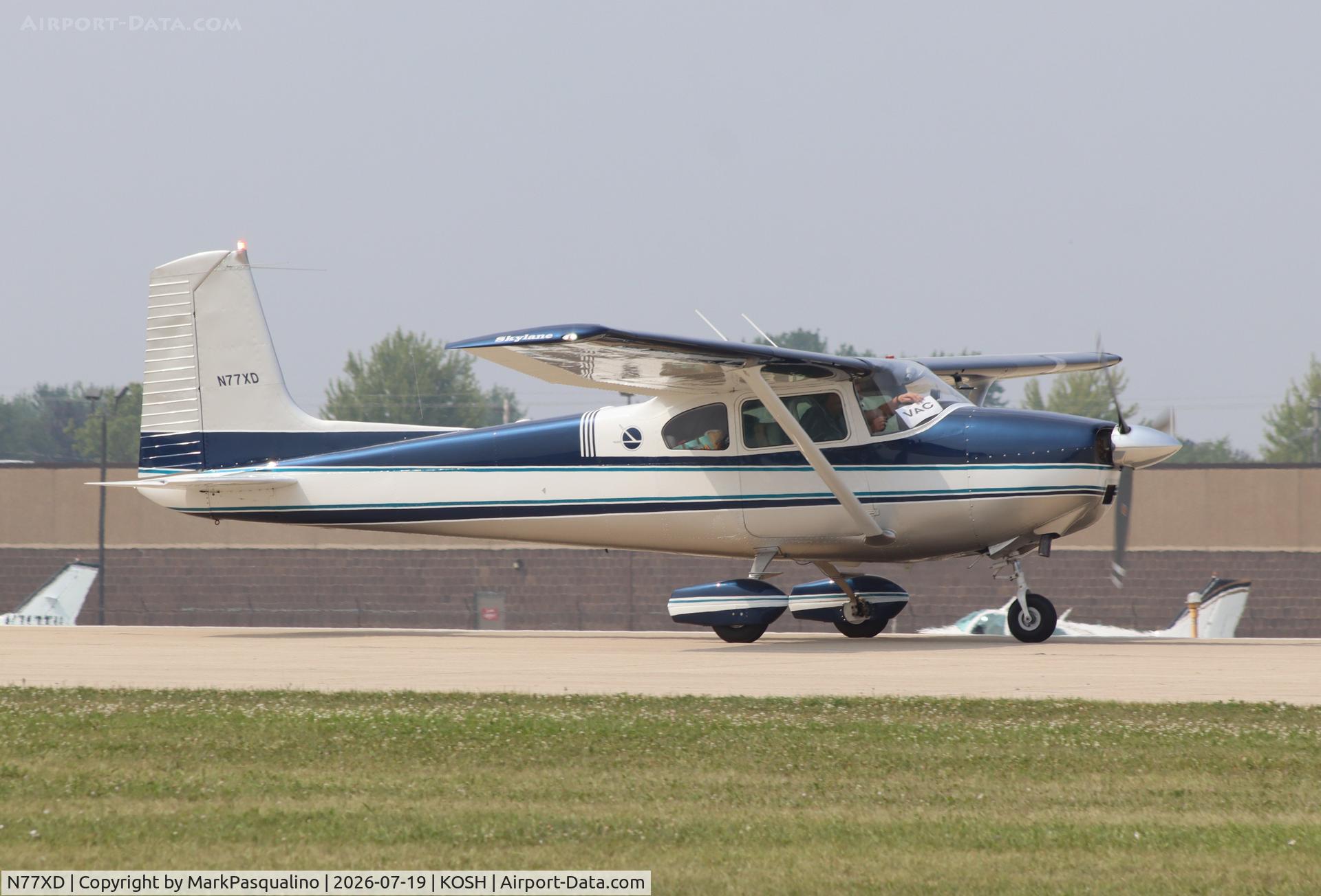 Aircraft N77XD, 1959 Cessna 182B Skylane, c/n 52237, Cessna 182B, at KOSH, photo by MarkPasqualino