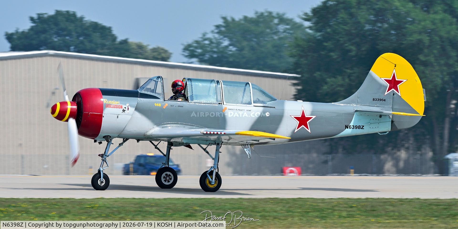 Aircraft N6398Z, 1984 Yakovlev Yak-52, c/n 833904, Oshkosh 26, at KOSH, photo by topgunphotography