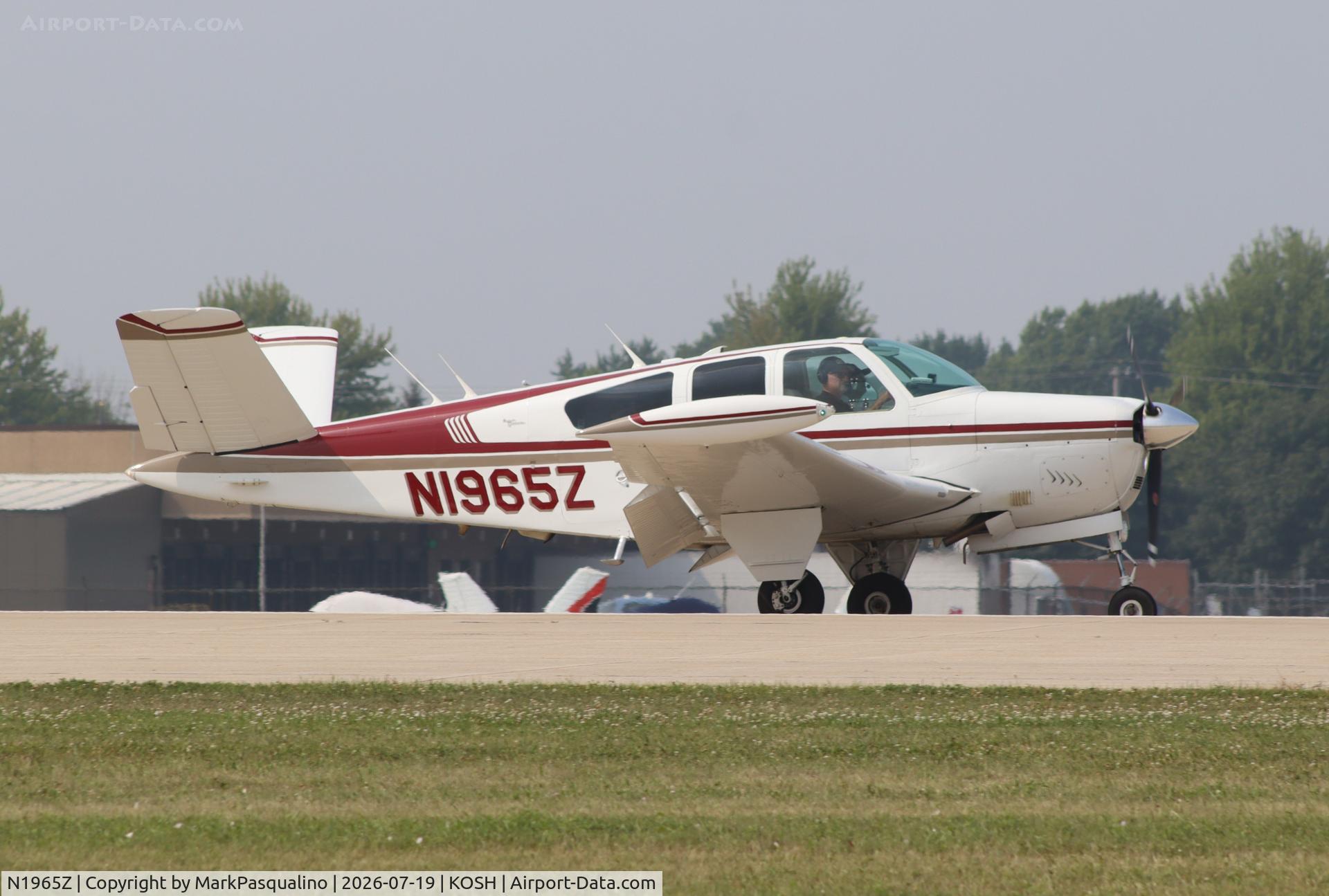 Aircraft N1965Z, 1965 Beech S35 Bonanza, c/n D-7805, Beech S35, at KOSH, photo by MarkPasqualino