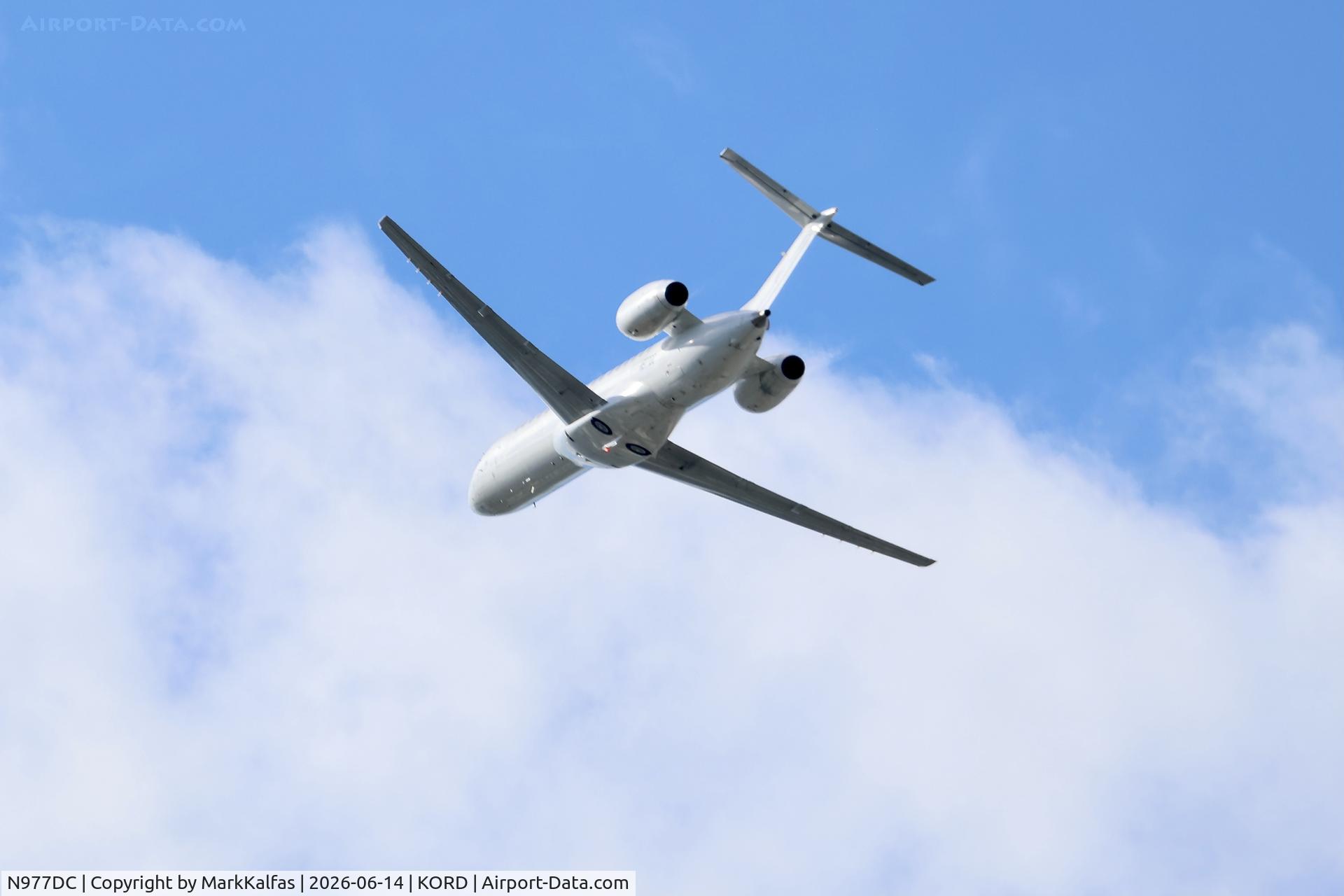 Aircraft N977DC, 2001 Embraer EMB-145LR, c/n 145370, E145 Key Lime Air Embraer ERJ-145 N977DC departing 28R KORD, at KORD, photo by MarkKalfas