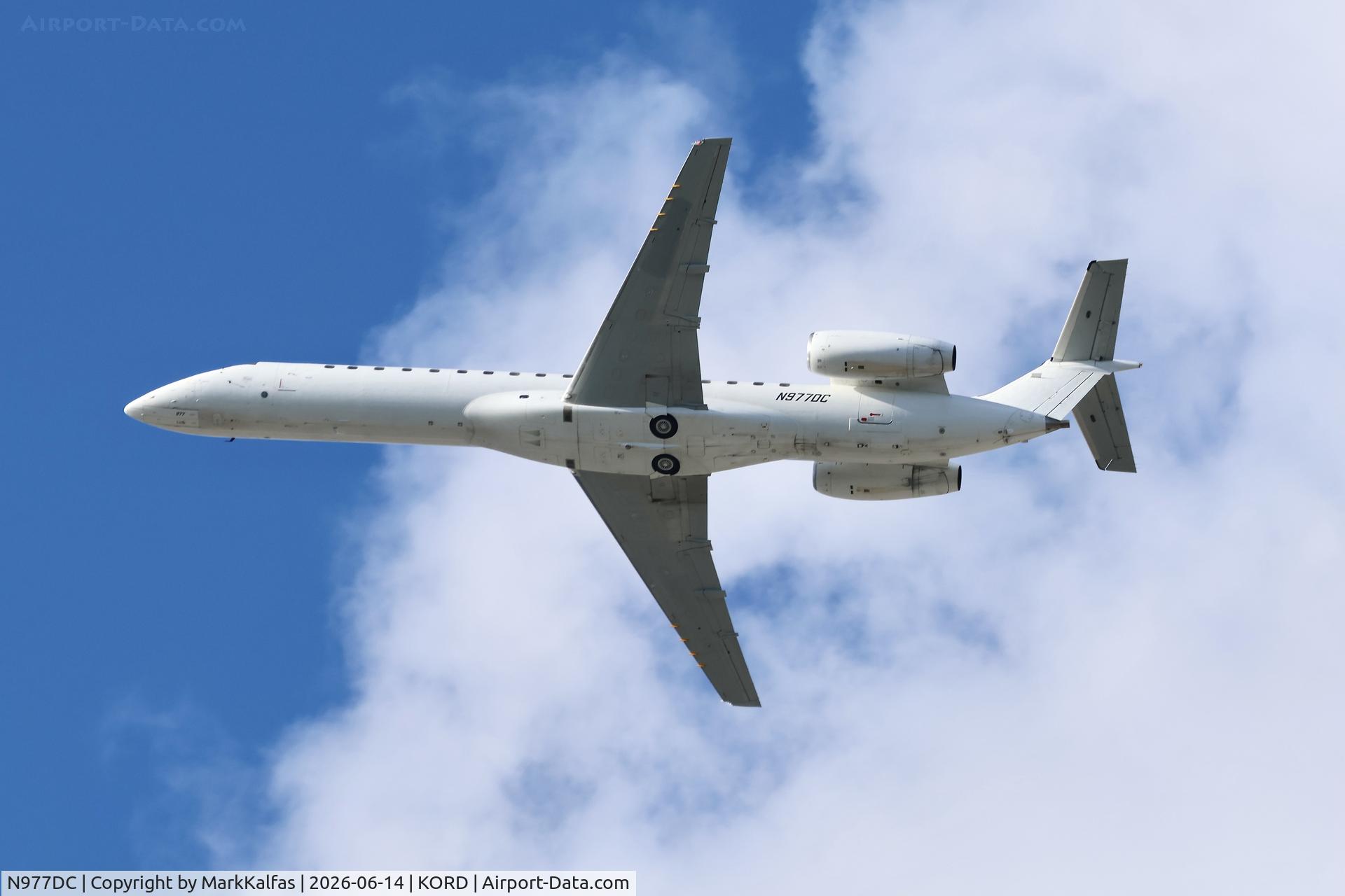Aircraft N977DC, 2001 Embraer EMB-145LR, c/n 145370, E145 Key Lime Air Embraer ERJ-145 N977DC departing 28R KORD, at KORD, photo by MarkKalfas