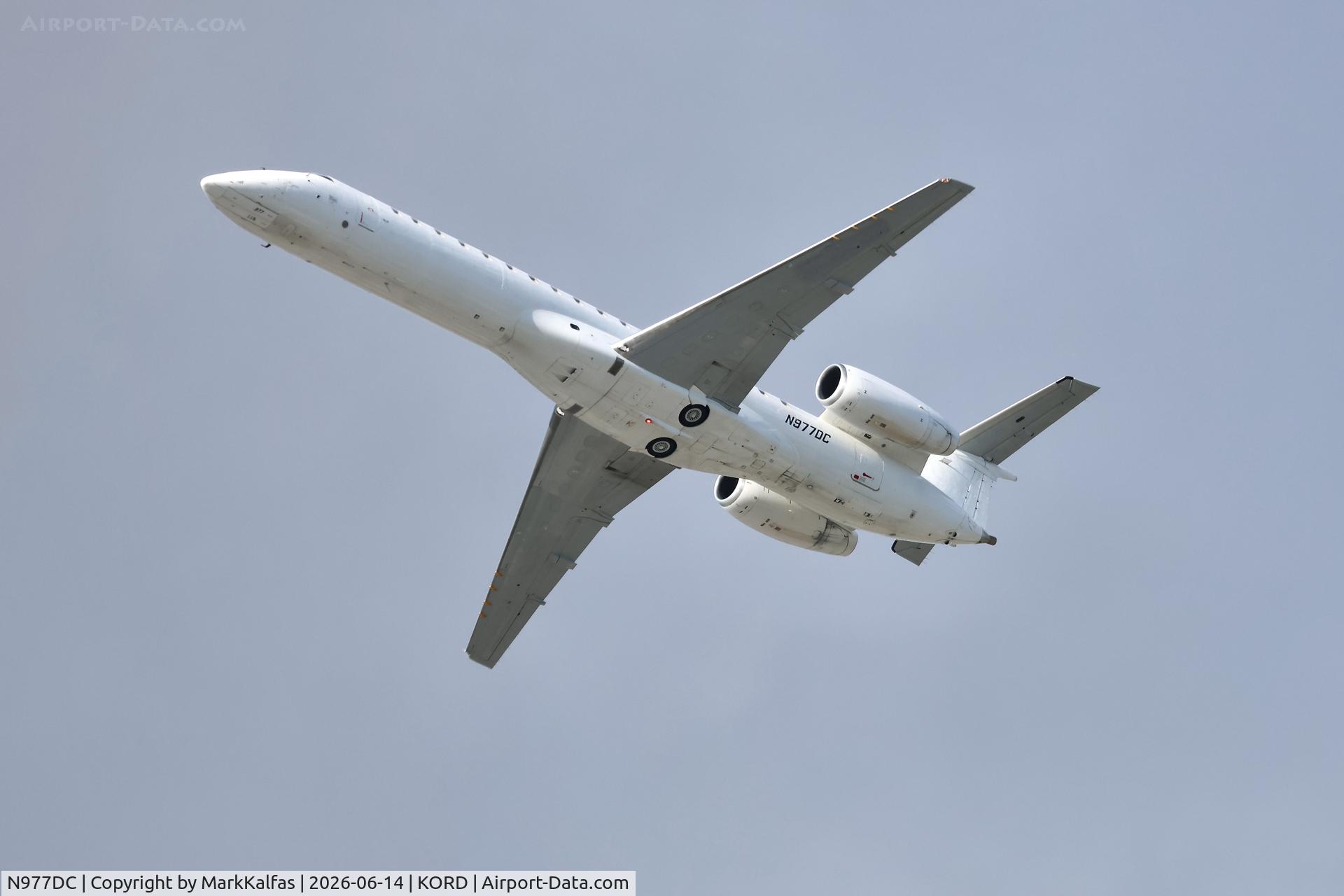 Aircraft N977DC, 2001 Embraer EMB-145LR, c/n 145370, E145 Key Lime Air Embraer ERJ-145 N977DC departing 28R KORD, at KORD, photo by MarkKalfas