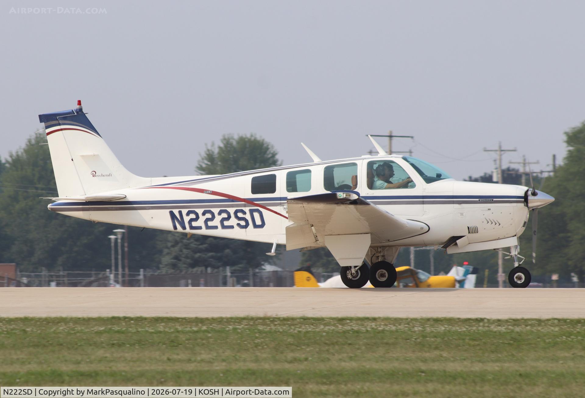Aircraft N222SD, 1973 Beech A36 Bonanza 36, c/n E-473, Beech A36, at KOSH, photo by MarkPasqualino