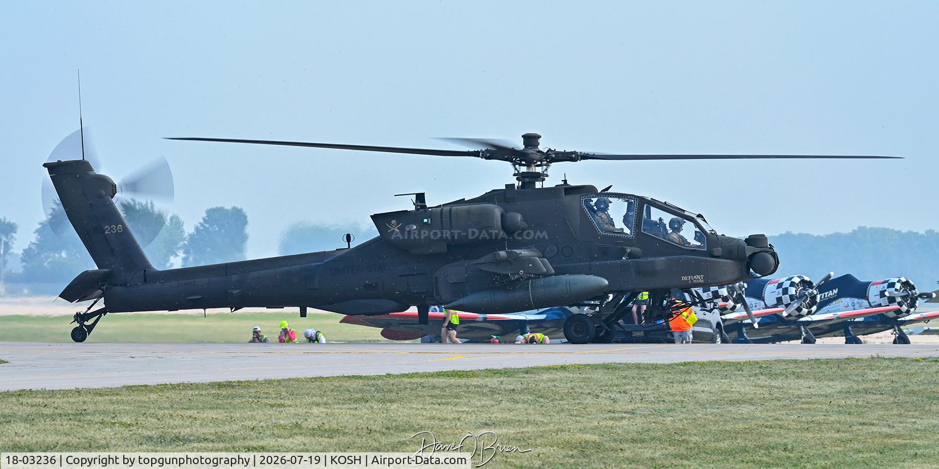 Aircraft 18-03236, 2019 Boeing AH-64E Apache, c/n NM236, GUARD36 taxiing to the Boeing Plaza, at KOSH, photo by topgunphotography