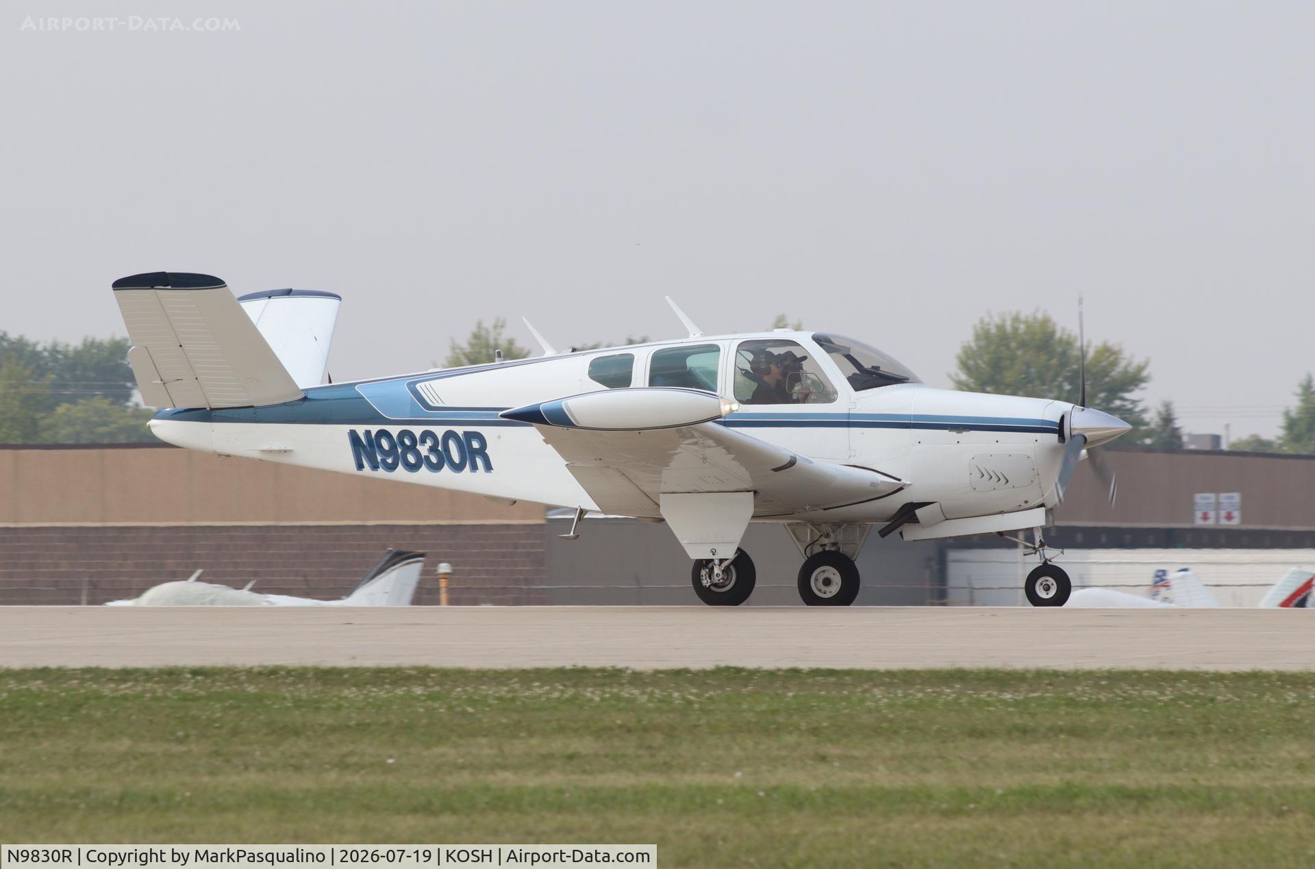 Aircraft N9830R, 1960 Beech M35 Bonanza, c/n D-6349, Beech M35, at KOSH, photo by MarkPasqualino