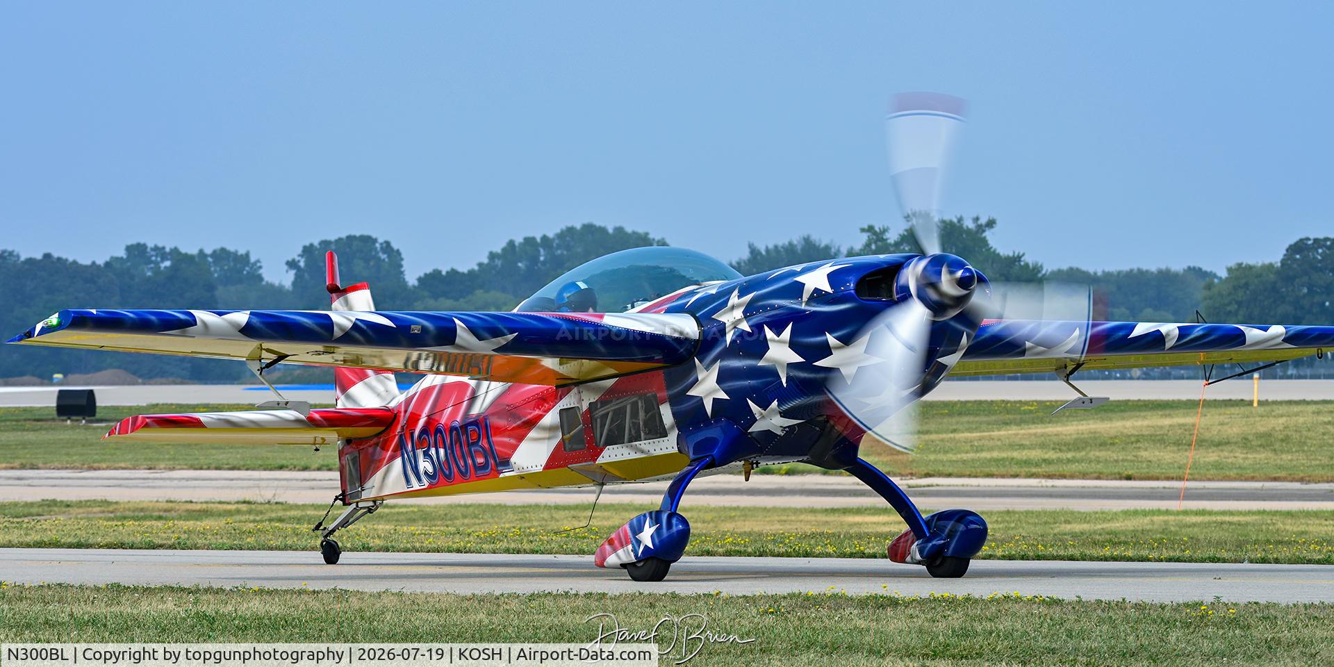 Aircraft N300BL, 1994 Extra EA-300, c/n 056, Oshkosh 26, at KOSH, photo by topgunphotography