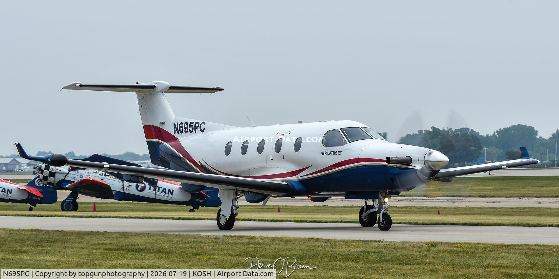 Aircraft N695PC, 1999 Pilatus PC-12/45, c/n 305, Oshkosh 26, at KOSH, photo by topgunphotography