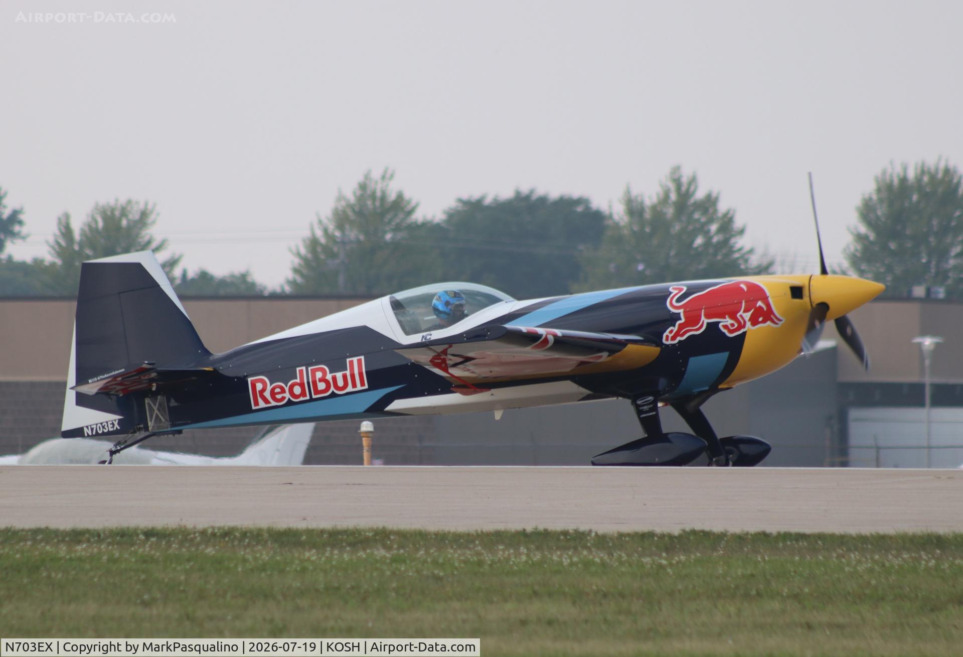 Aircraft N703EX, 2006 Extra EA-300S, c/n 1035, Extra EA-300S, at KOSH, photo by MarkPasqualino