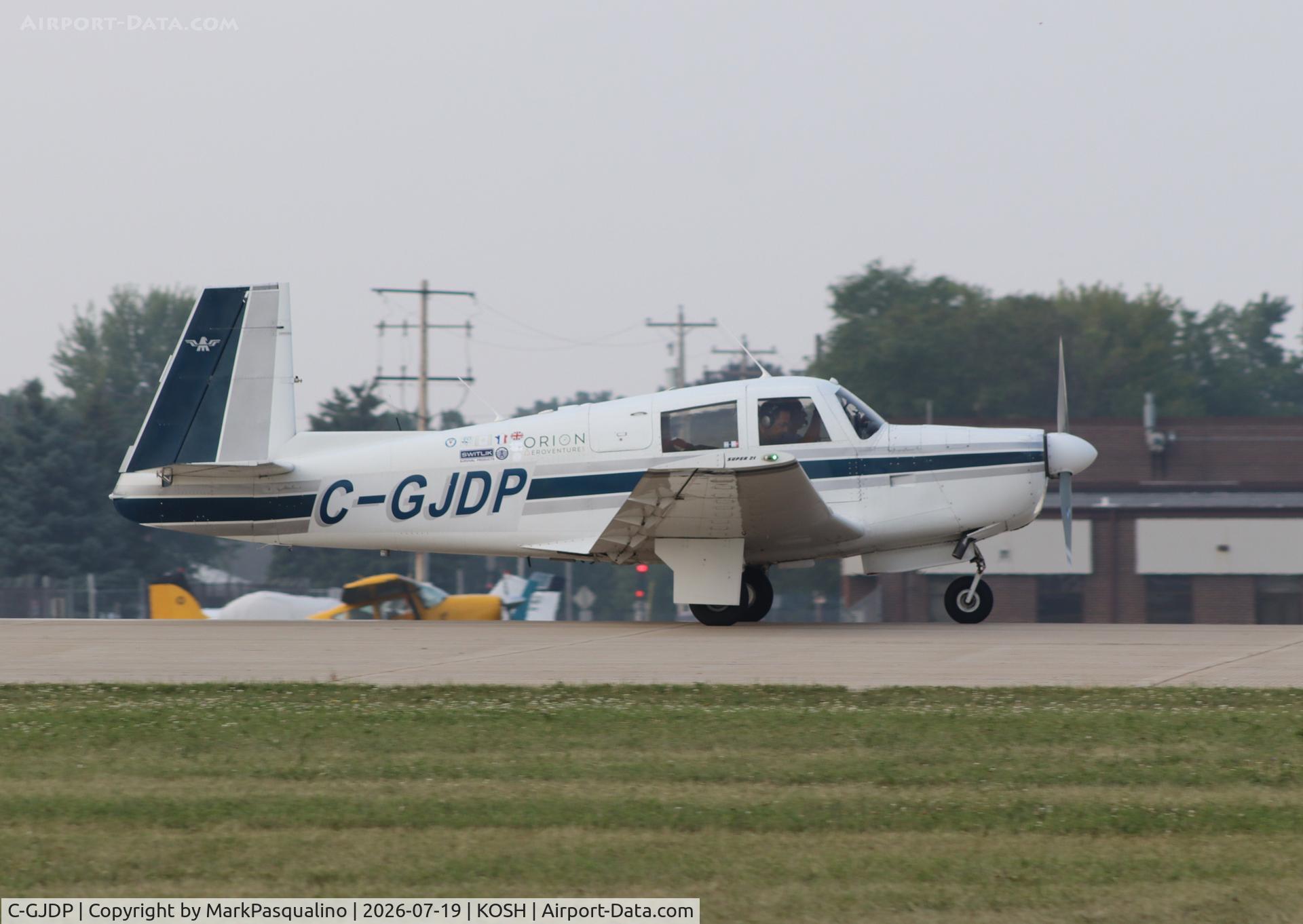 Aircraft C-GJDP, 1965 Mooney M20E, c/n 748, Mooney M20E, at KOSH, photo by MarkPasqualino