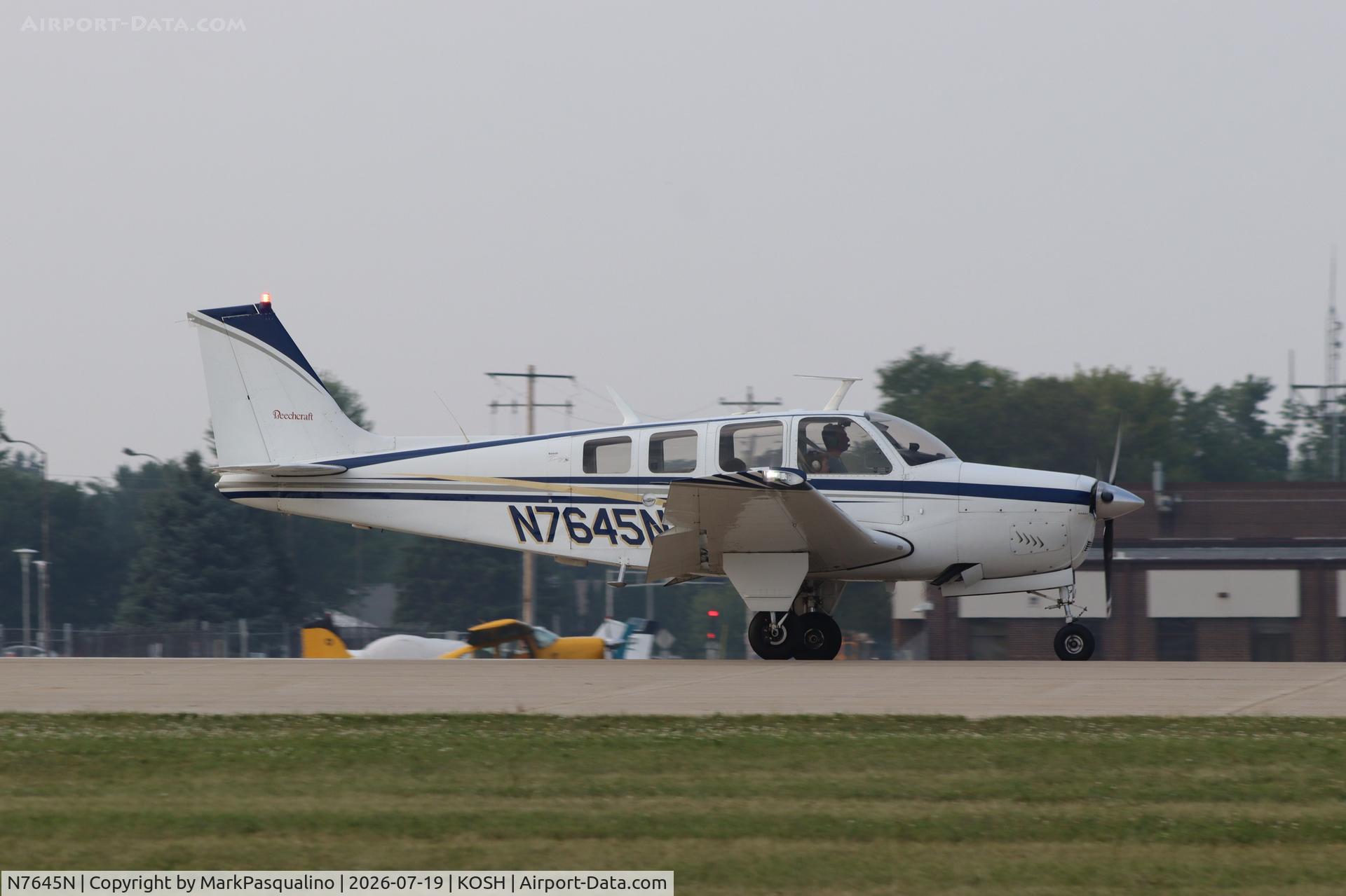 Aircraft N7645N, 1968 Beech 36 Bonanza, c/n E-65, Beech 36, at KOSH, photo by MarkPasqualino