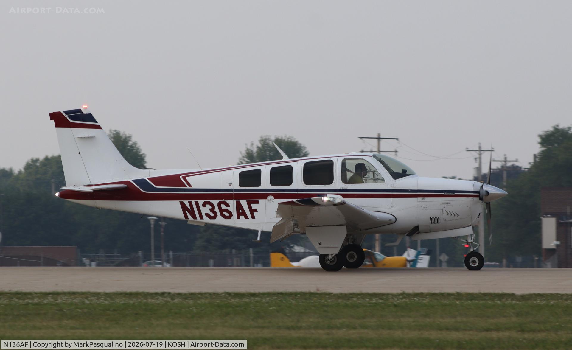 Aircraft N136AF, 1981 Beech A36 Bonanza 36, c/n E1861, Beech A36, at KOSH, photo by MarkPasqualino