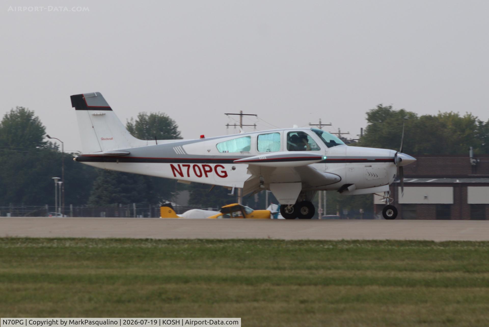 Aircraft N70PG, 1991 Beech F33A Bonanza, c/n CE-1635, Beech F33A, at KOSH, photo by MarkPasqualino