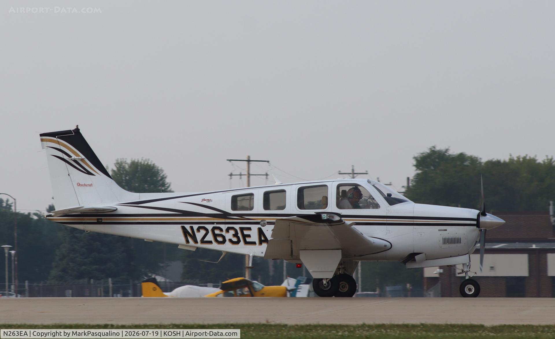 Aircraft N263EA, 2002 Raytheon Aircraft Company A36 Bonanza, c/n E-3437, Beech A36, at KOSH, photo by MarkPasqualino